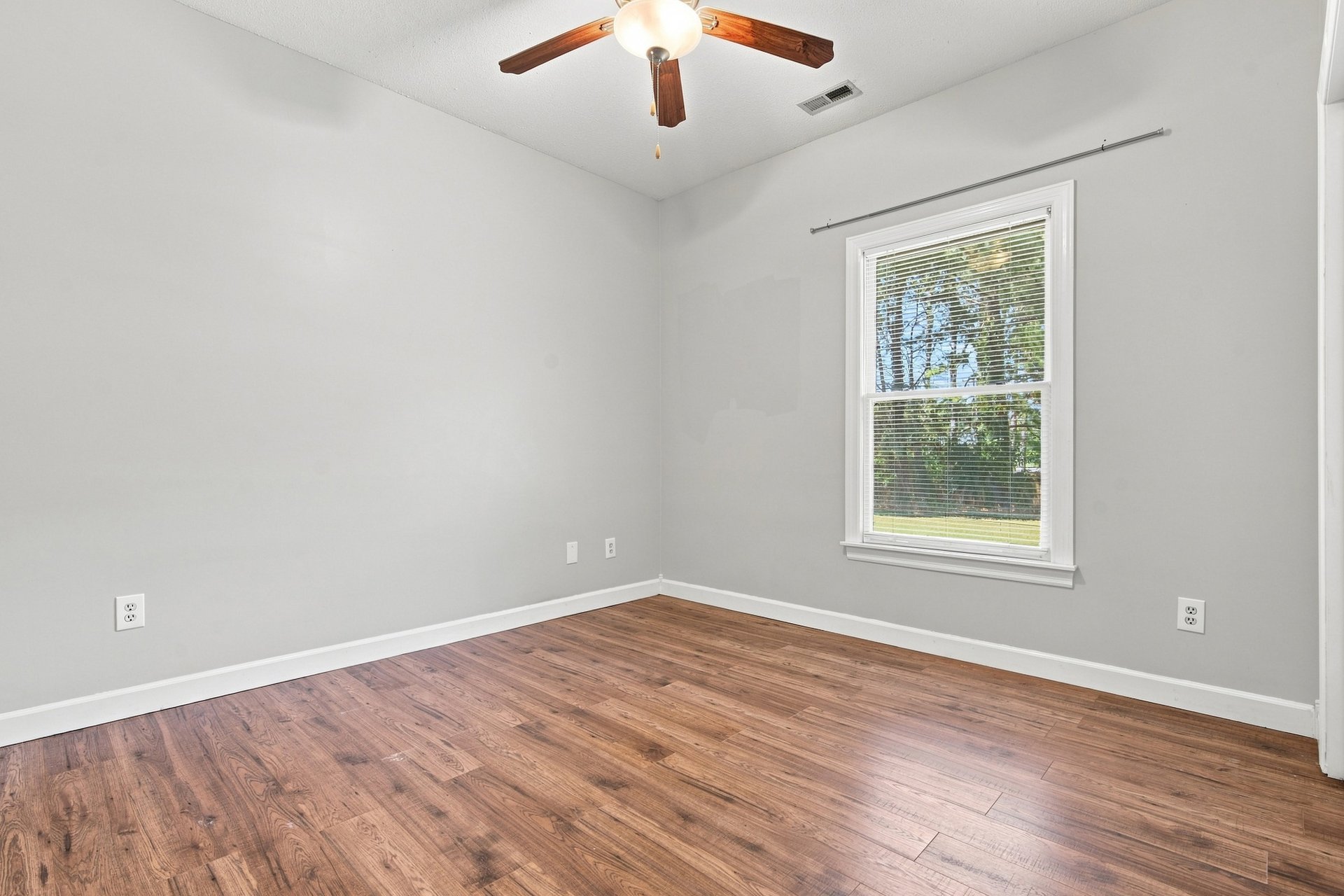 Full-Brick Beauty with Spacious Corner Lot & Private Fenced Backyard