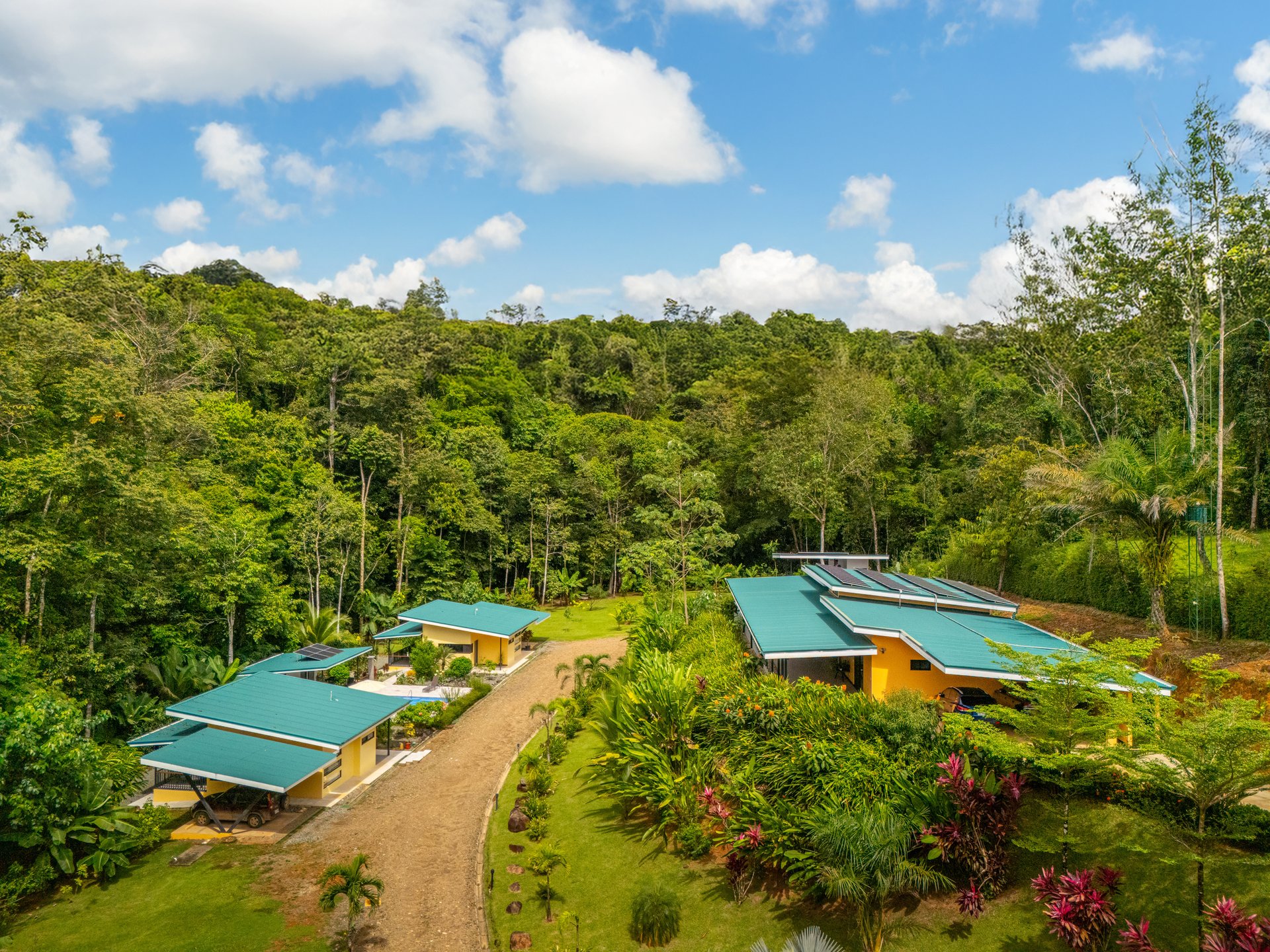Tropical Family Compound | Luxury Home, 2 Villas, River & Cascades - 2.3 Acres