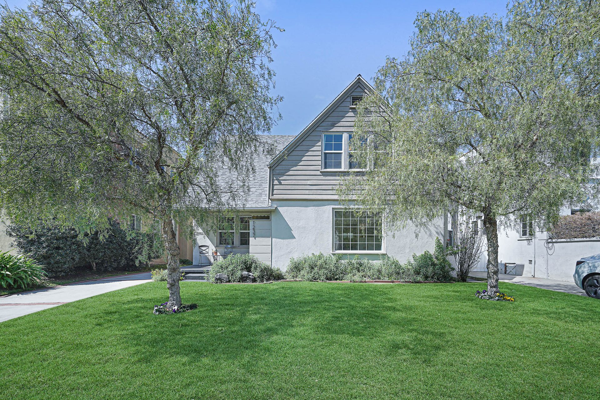 Light & Bright East Coast Traditional Home with Exterior Office & Bonus $2400/mos Rental Unit Above Garage -  in coveted Miracle Mile South!