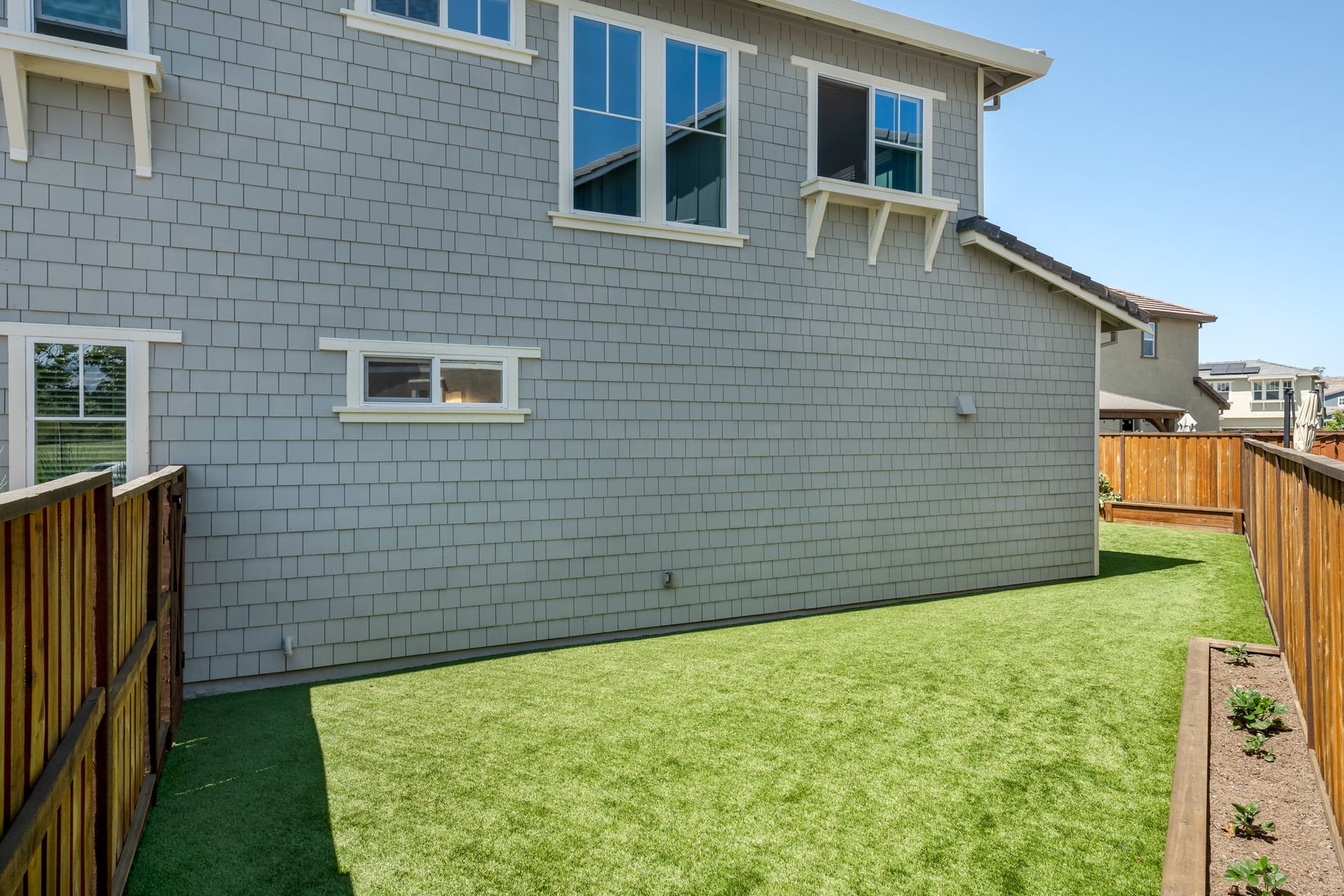 Newly Constructed Residence with Spacious Flat Yard- Represented Buyer
