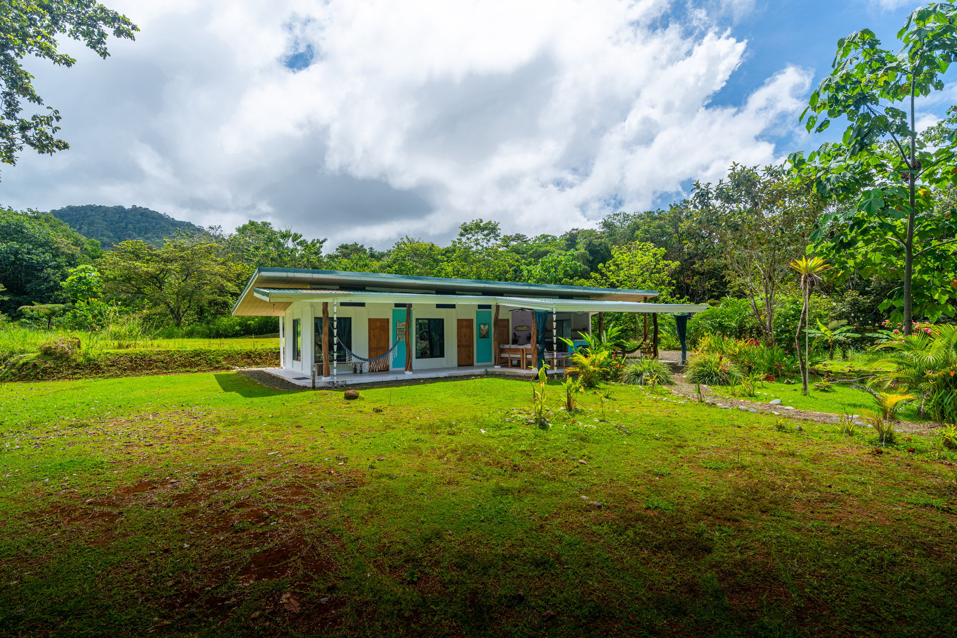 Plant Your Roots at Tierra Bendita! 2.5 Acres, River Frontage, 2 Bedroom Home, Private, Easy Access!