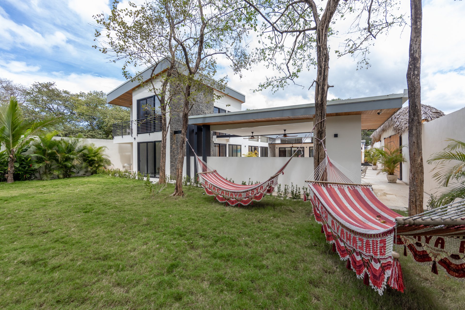 Casa Guacamaya Roja Lot B20 | Elegant 4-Bedroom Home with Pool & Outdoor Kitchen, Steps from Playa Grande Beach, Costa Rica