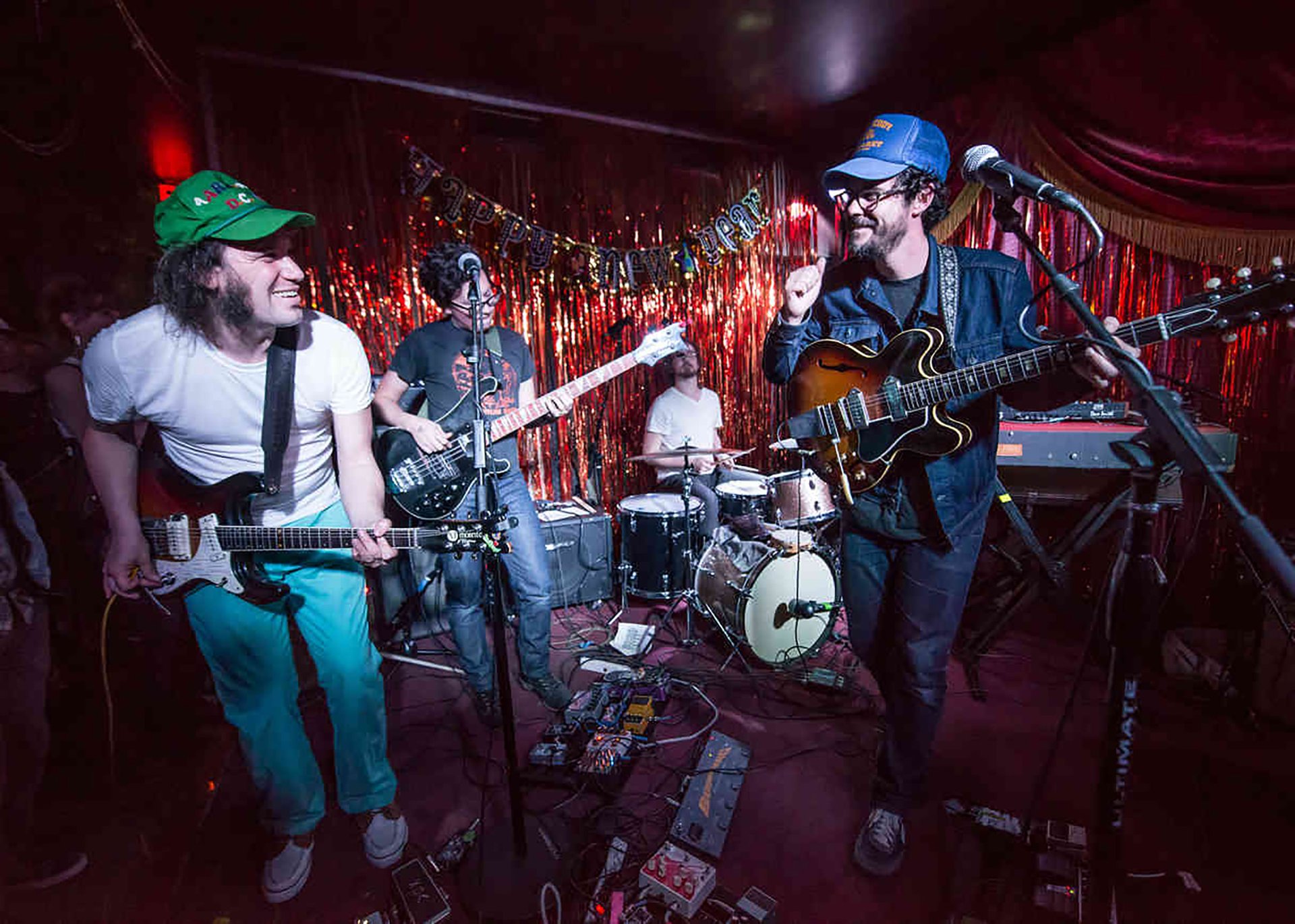 People toasting with wine glasses