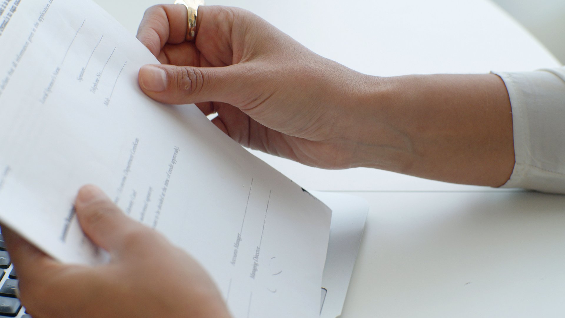 a person holding a document