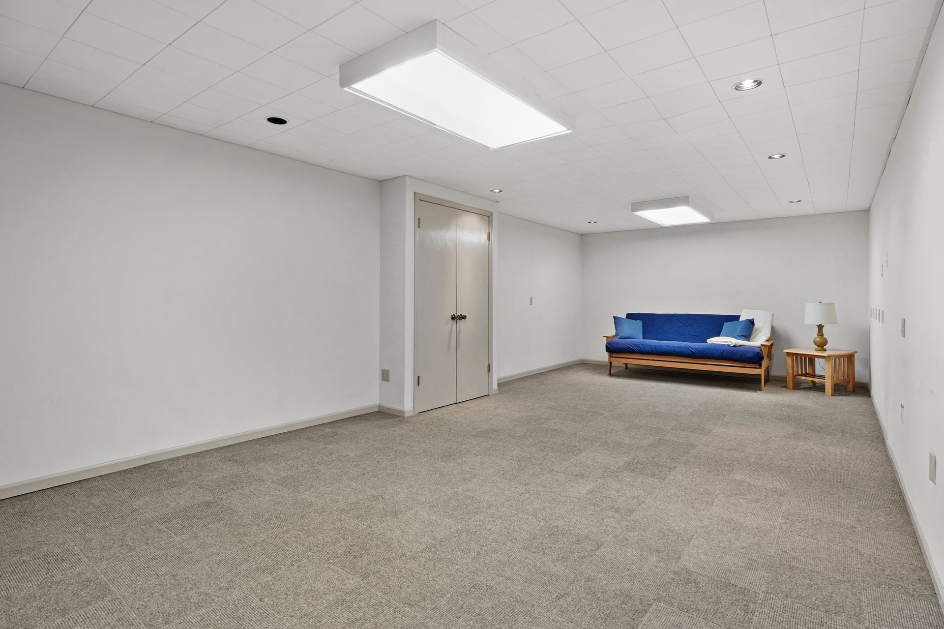 Finished lower level rec room at 10 Stonecrest Circle in Madison.