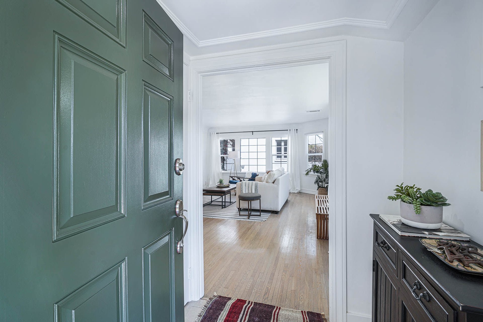 Light & Bright East Coast Traditional Home with Exterior Office & Bonus $2400/mos Rental Unit Above Garage -  in coveted Miracle Mile South!