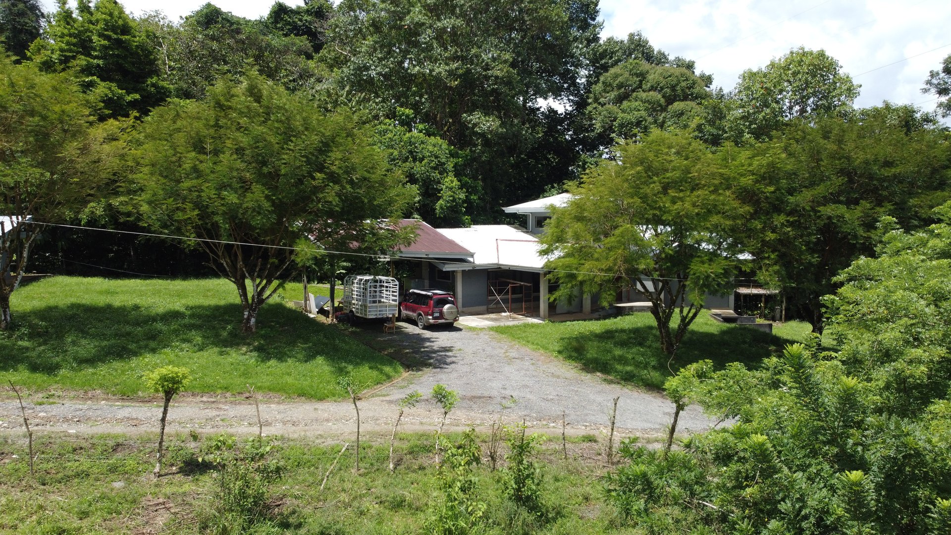 Fixer-Upper Home with an studio Office in Palmar Norte on a 7.58 Acres Property
