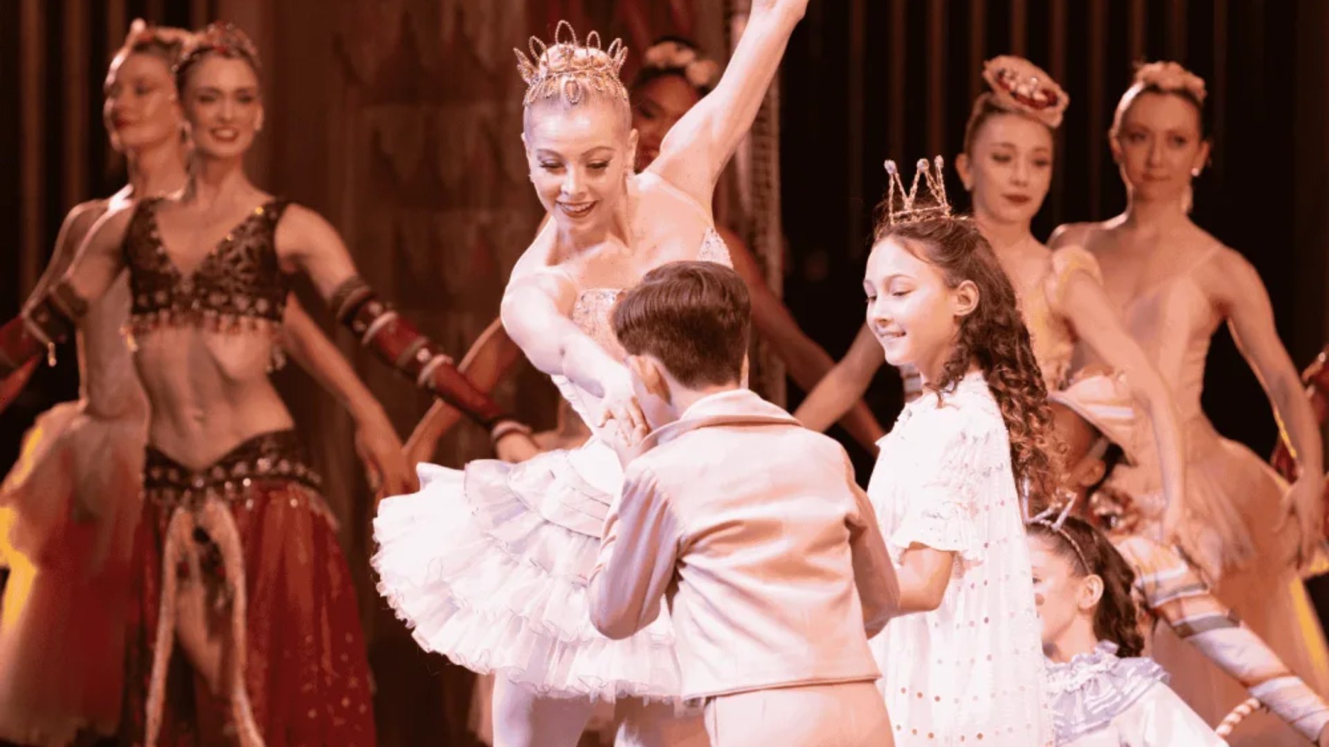 The Nutcracker ballet performance in Miami featuring Sugar Plum Fairy and Prince with young dancers in festive costumes by The Edit Real Estate