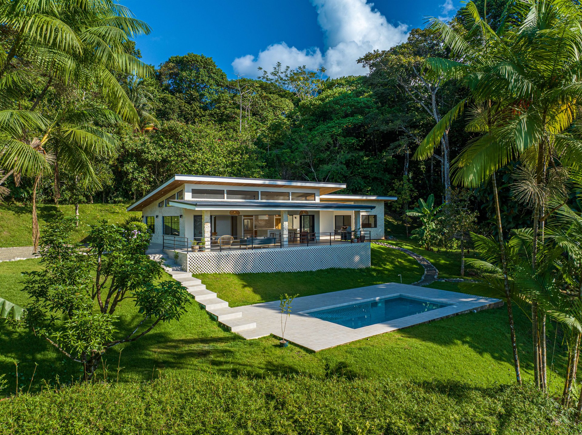 MOVE-IN READY OCEAN VIEW HOME IN CINCO VENTANAS WITH MAJESTIC RIVER ACCESS