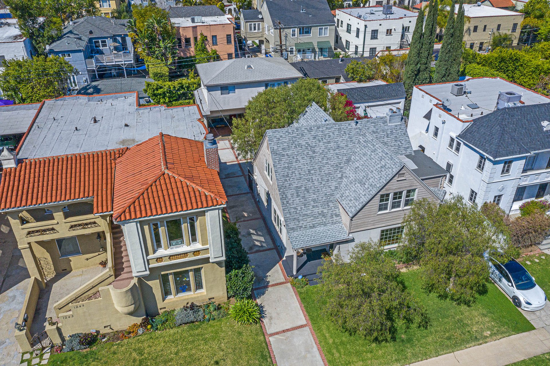 Light & Bright East Coast Traditional Home with Exterior Office & Bonus $2400/mos Rental Unit Above Garage -  in coveted Miracle Mile South!