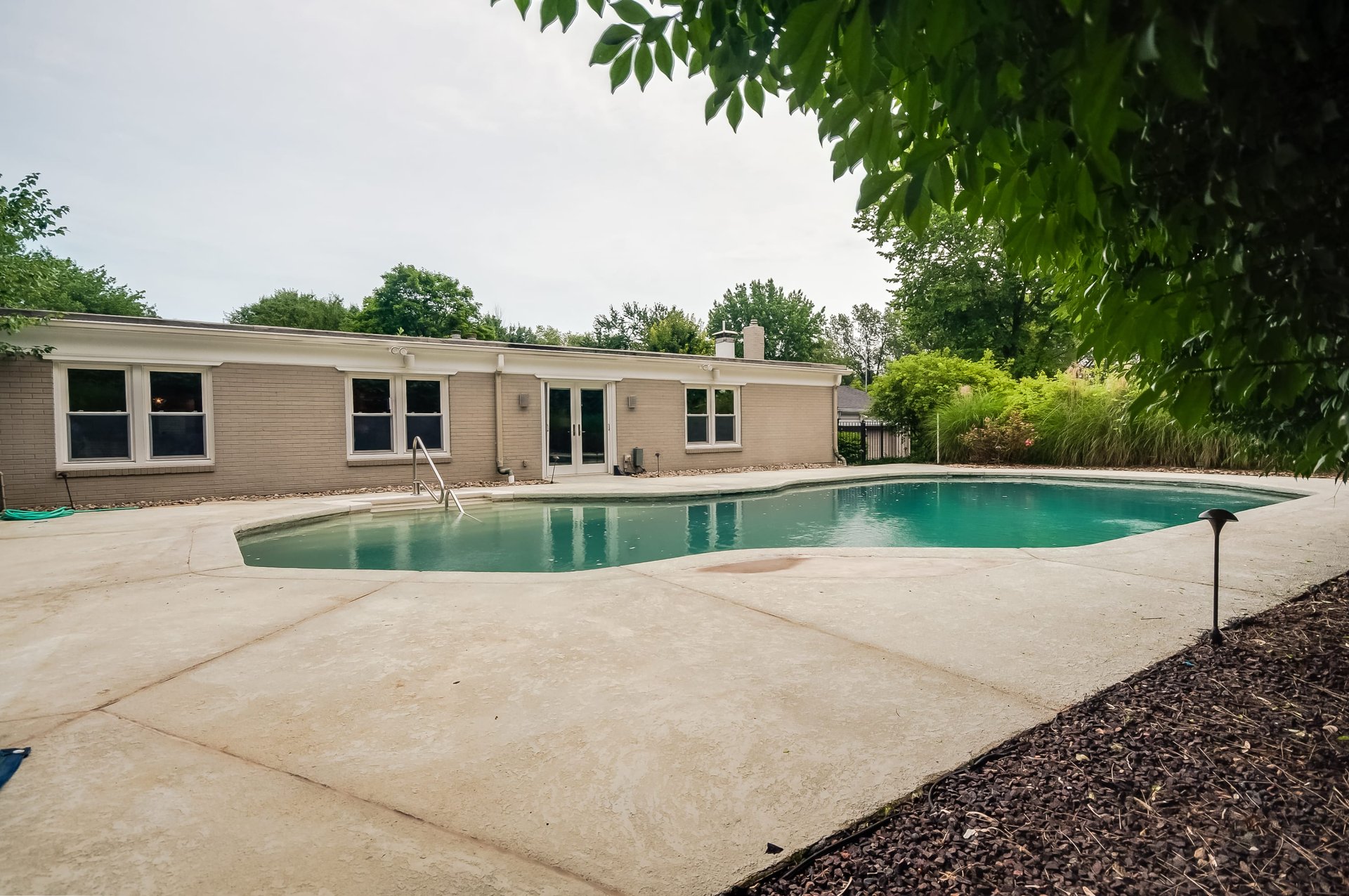 Sophisticated Ladue Ranch With Pool and Carriage House