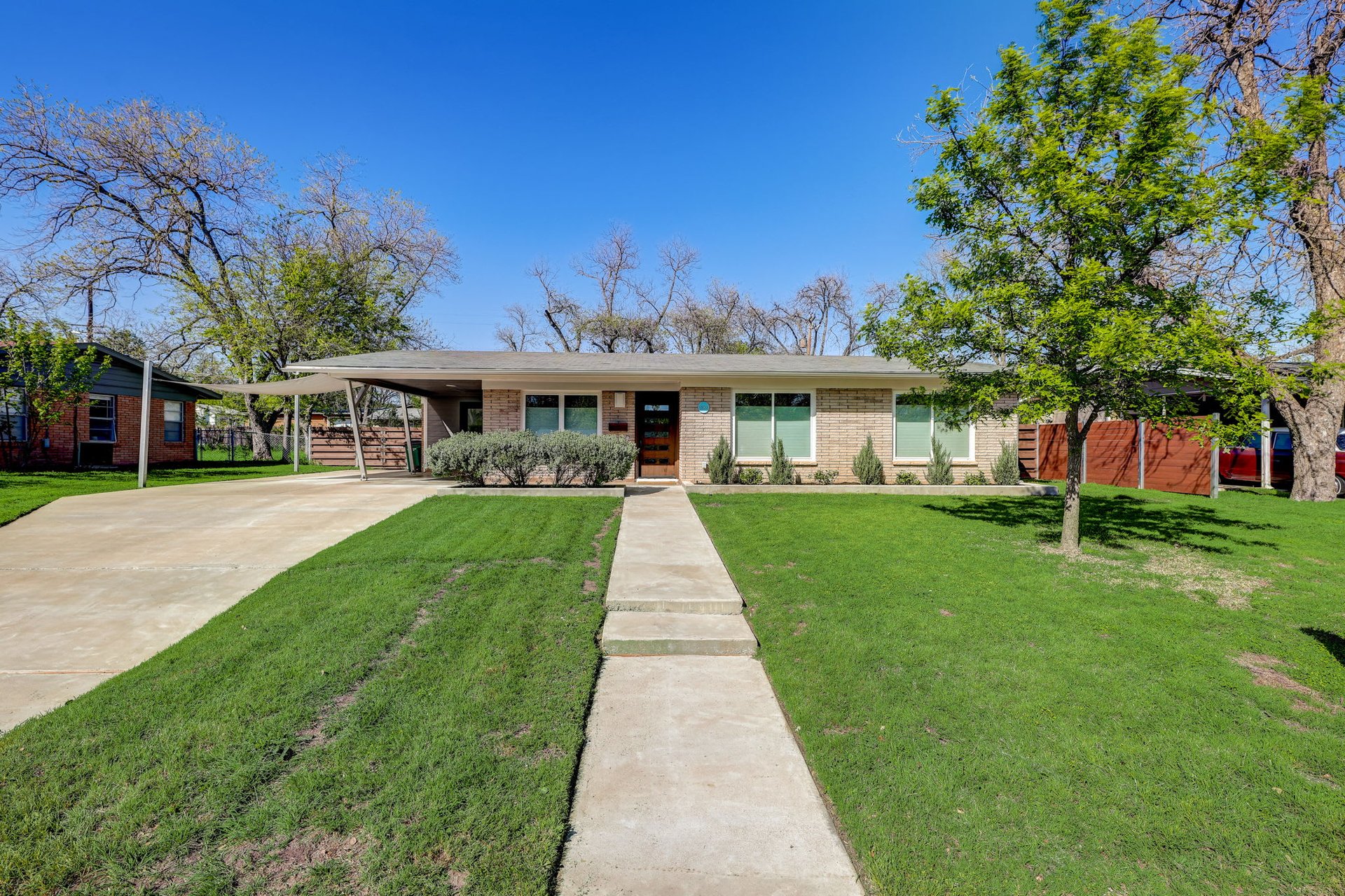 Stunning modern mid-century rebuilt home in the sought-after Delwood Heights near Mueller!