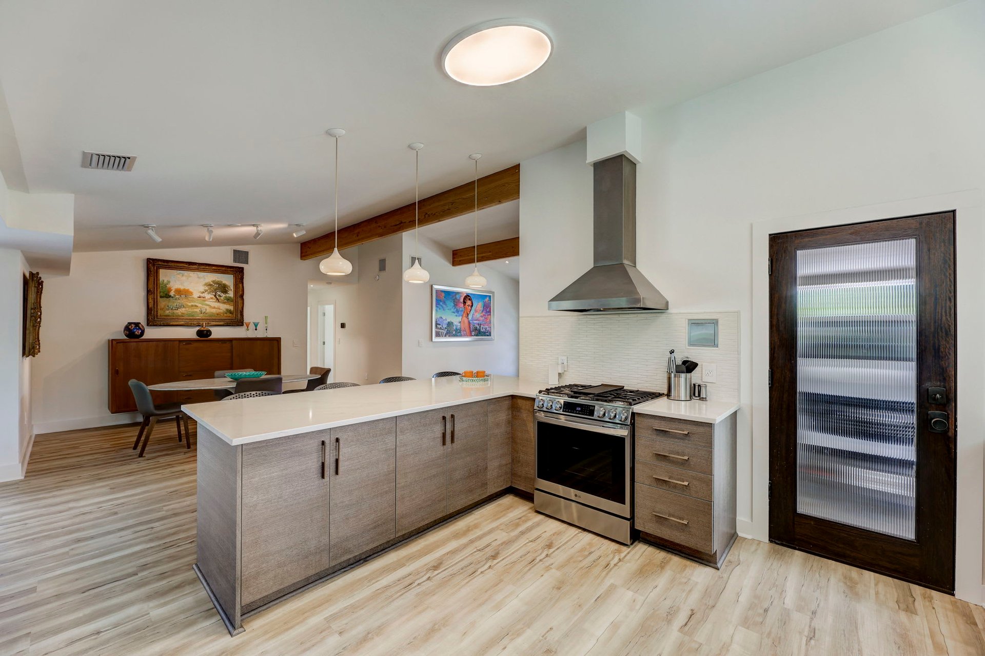 Stunning modern mid-century rebuilt home in the sought-after Delwood Heights near Mueller!