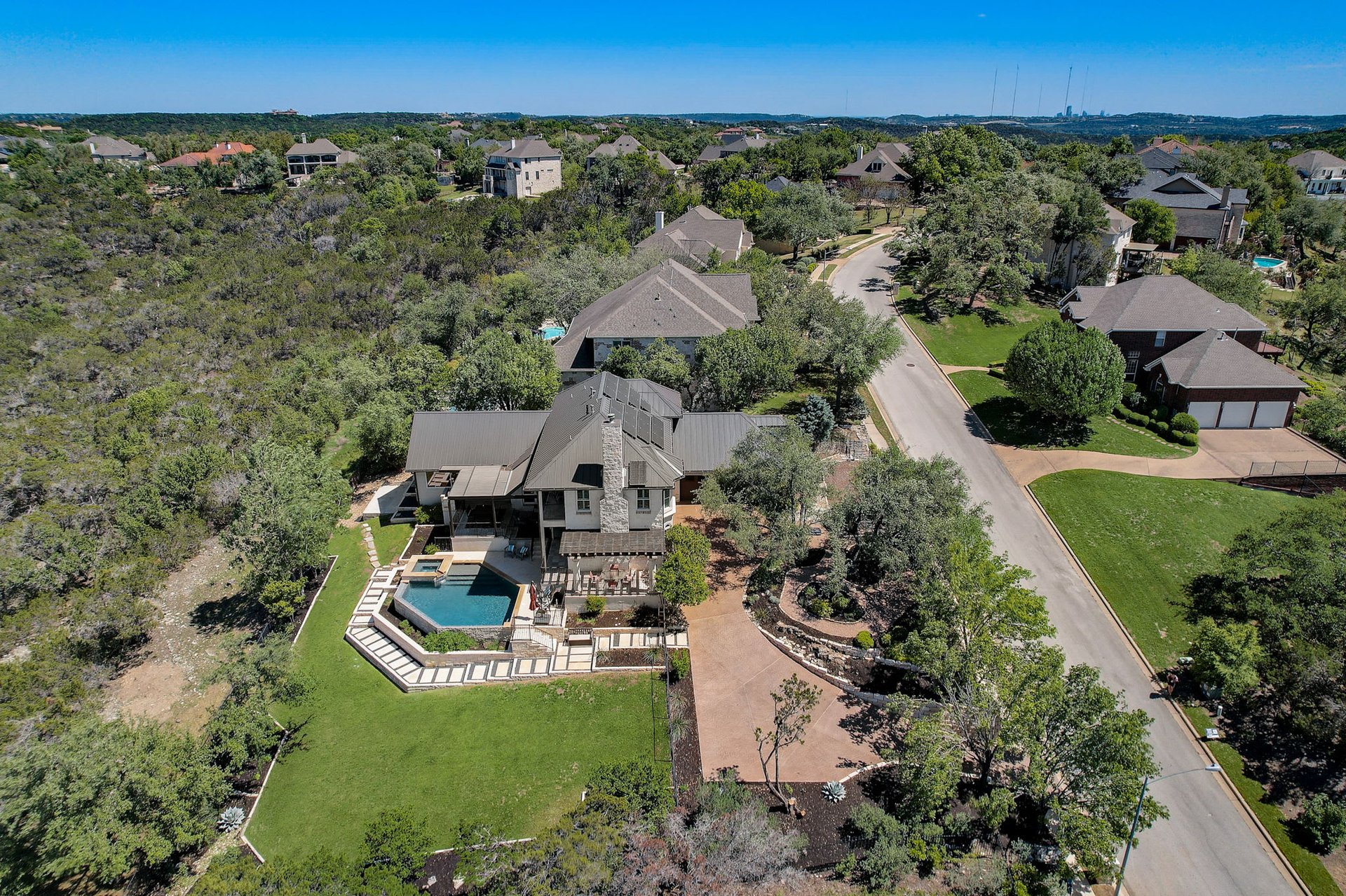 Hill Country Paradise: Luxurious 4/3 Home with Heated Pool/Spa and Spectacular Sunset Views in River Place!