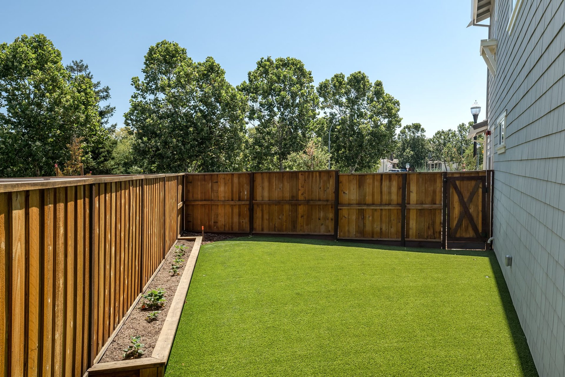 Newly Constructed Residence with Spacious Flat Yard- Represented Buyer