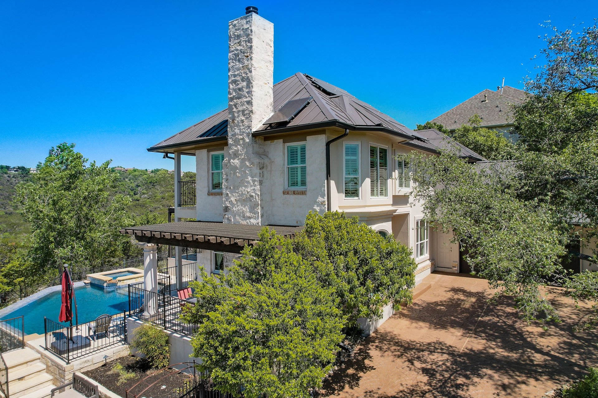 Hill Country Paradise: Luxurious 4/3 Home with Heated Pool/Spa and Spectacular Sunset Views in River Place!