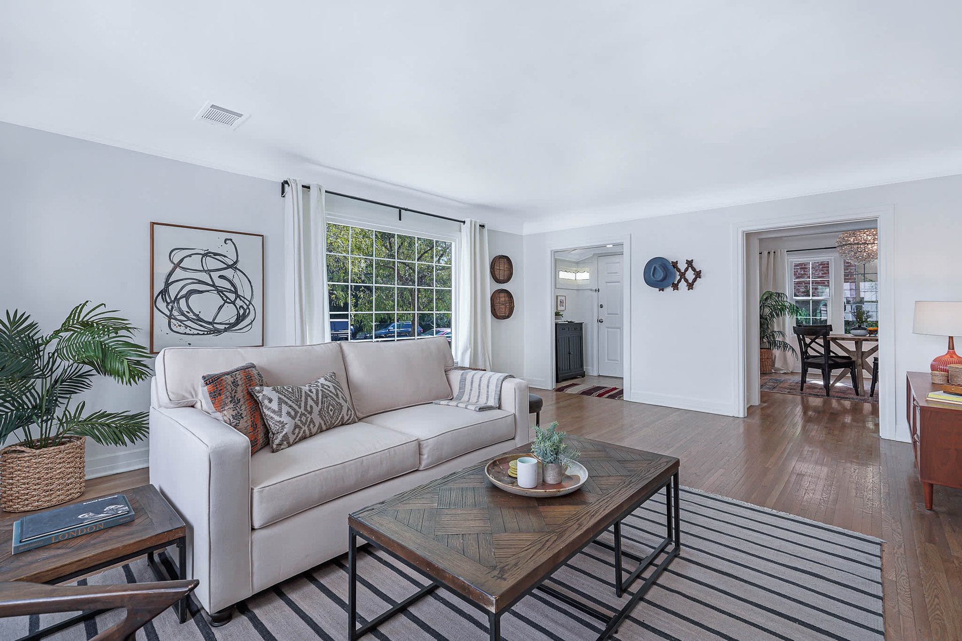 Light & Bright East Coast Traditional Home with Exterior Office & Bonus $2400/mos Rental Unit Above Garage -  in coveted Miracle Mile South!