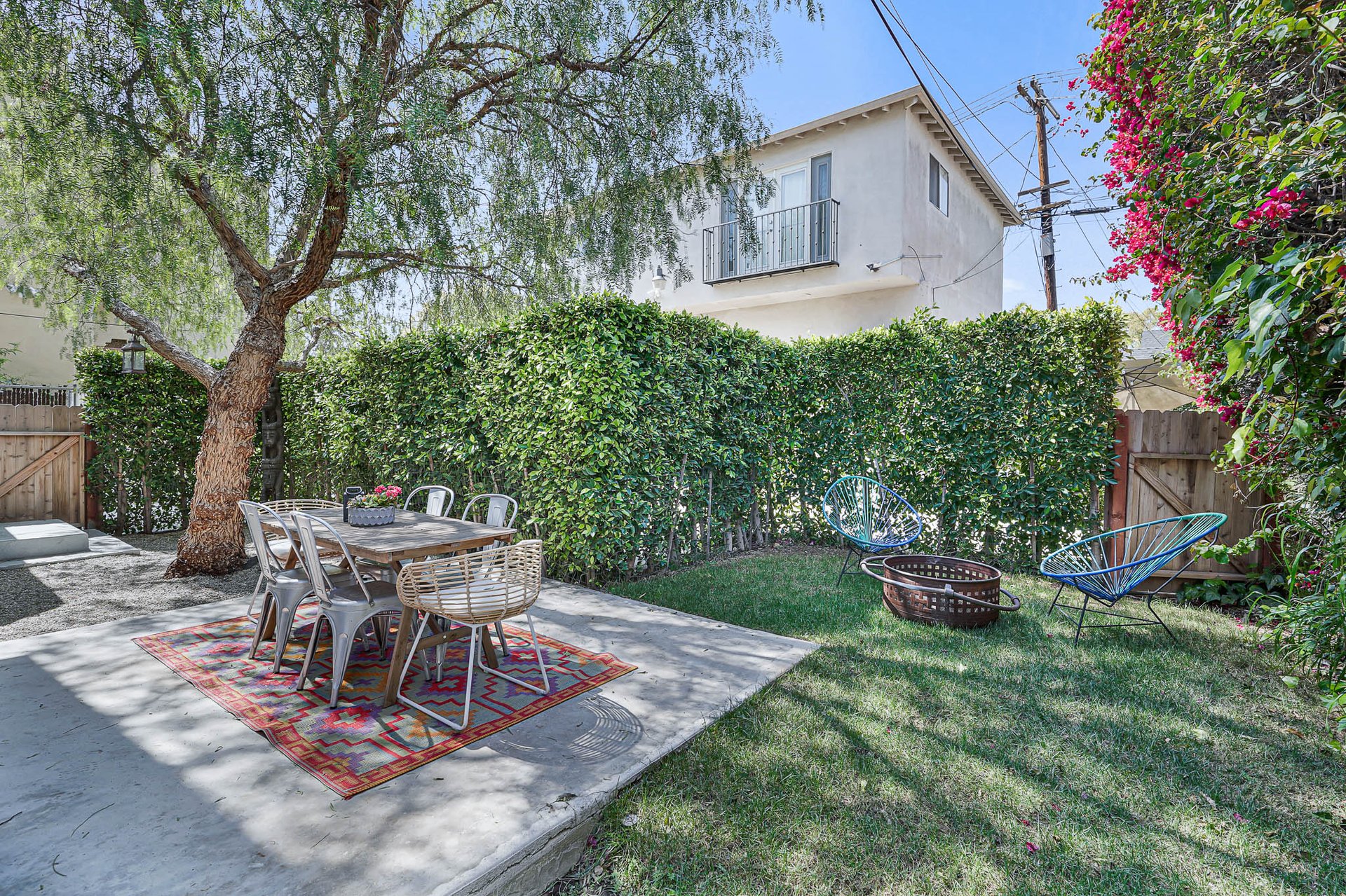 Light & Bright East Coast Traditional Home with Exterior Office & Bonus $2400/mos Rental Unit Above Garage -  in coveted Miracle Mile South!