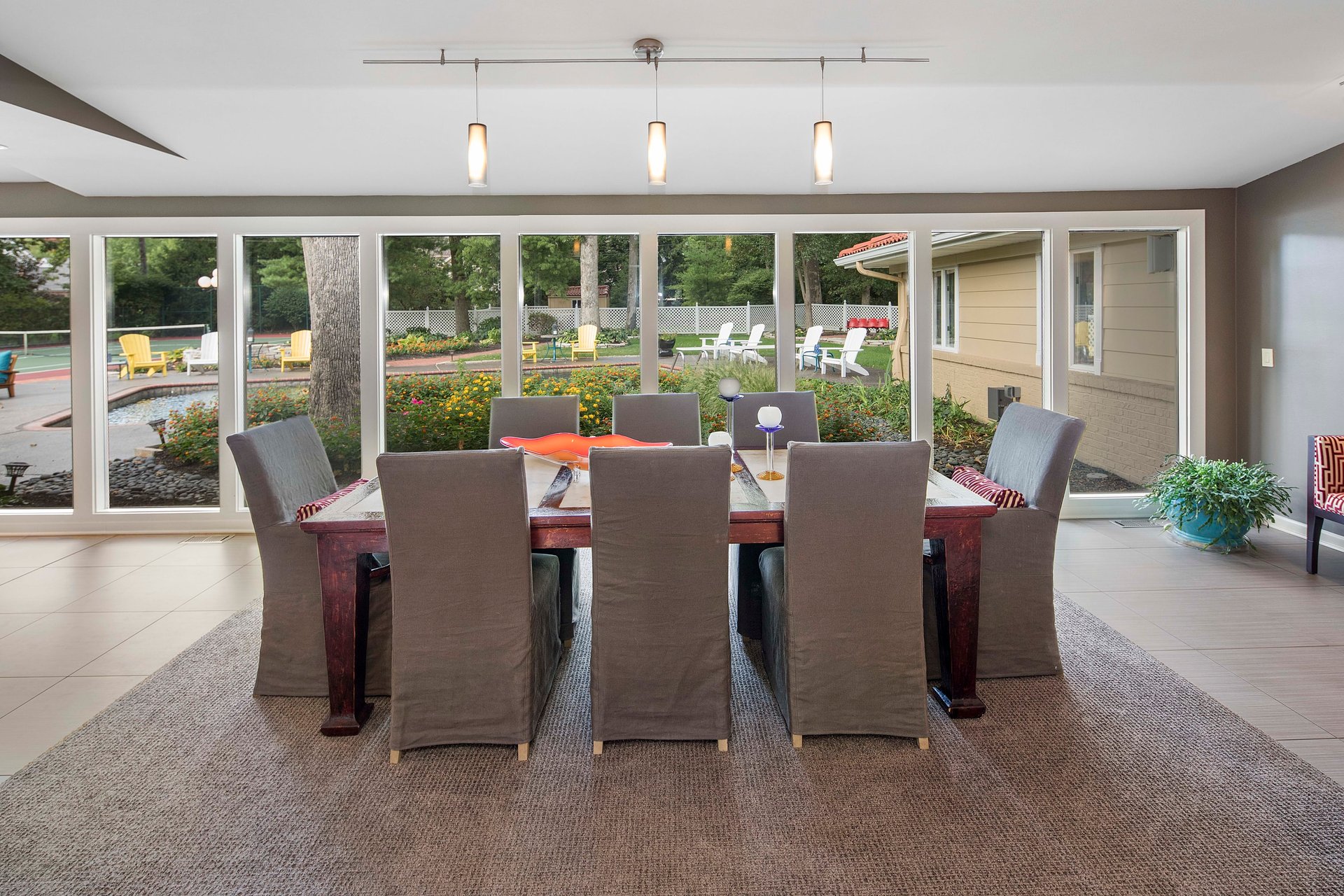 A Special Retreat on a Prized One Acre Lot With Pool and Tennis Court