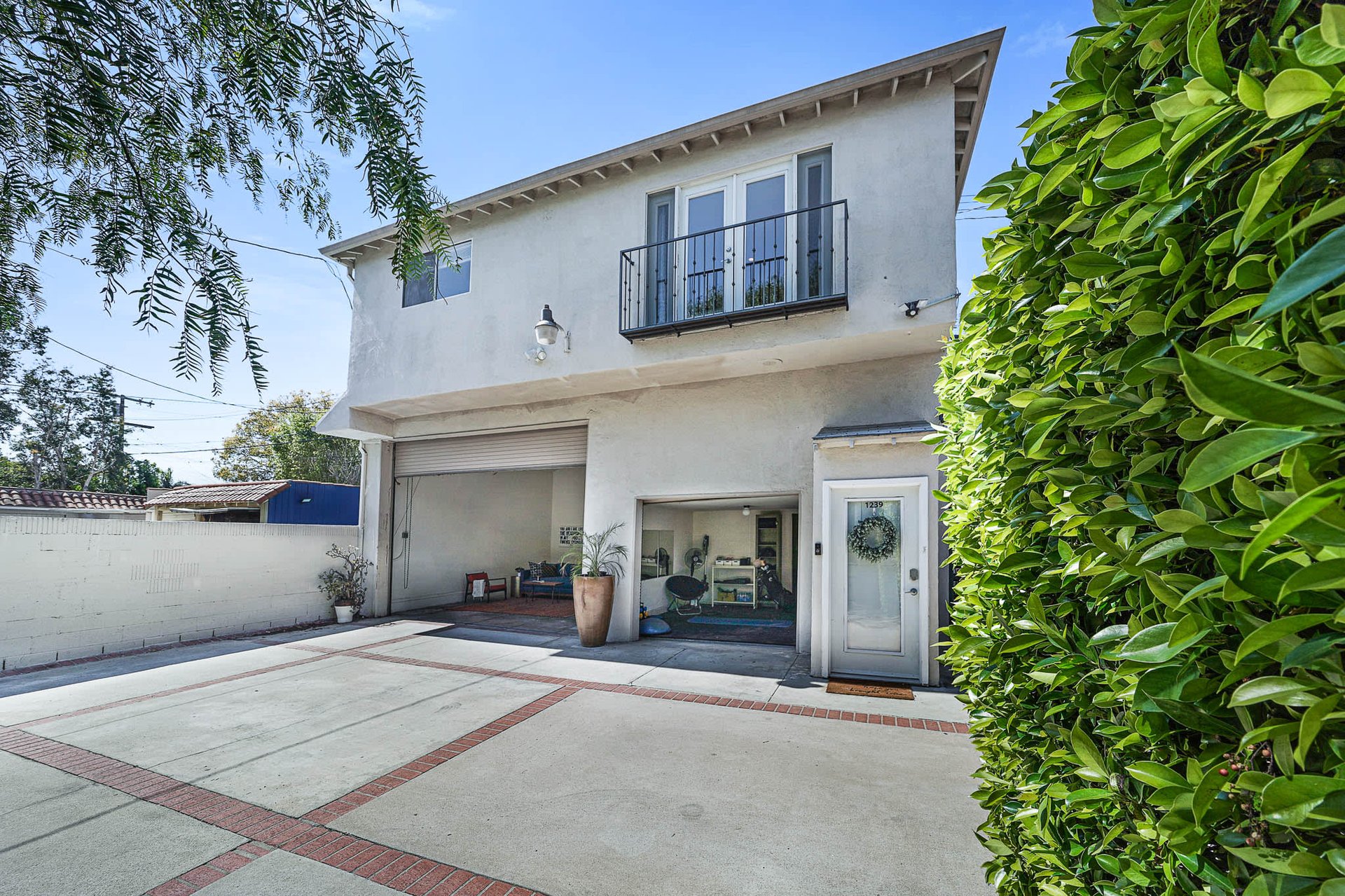 Light & Bright East Coast Traditional Home with Exterior Office & Bonus $2400/mos Rental Unit Above Garage -  in coveted Miracle Mile South!