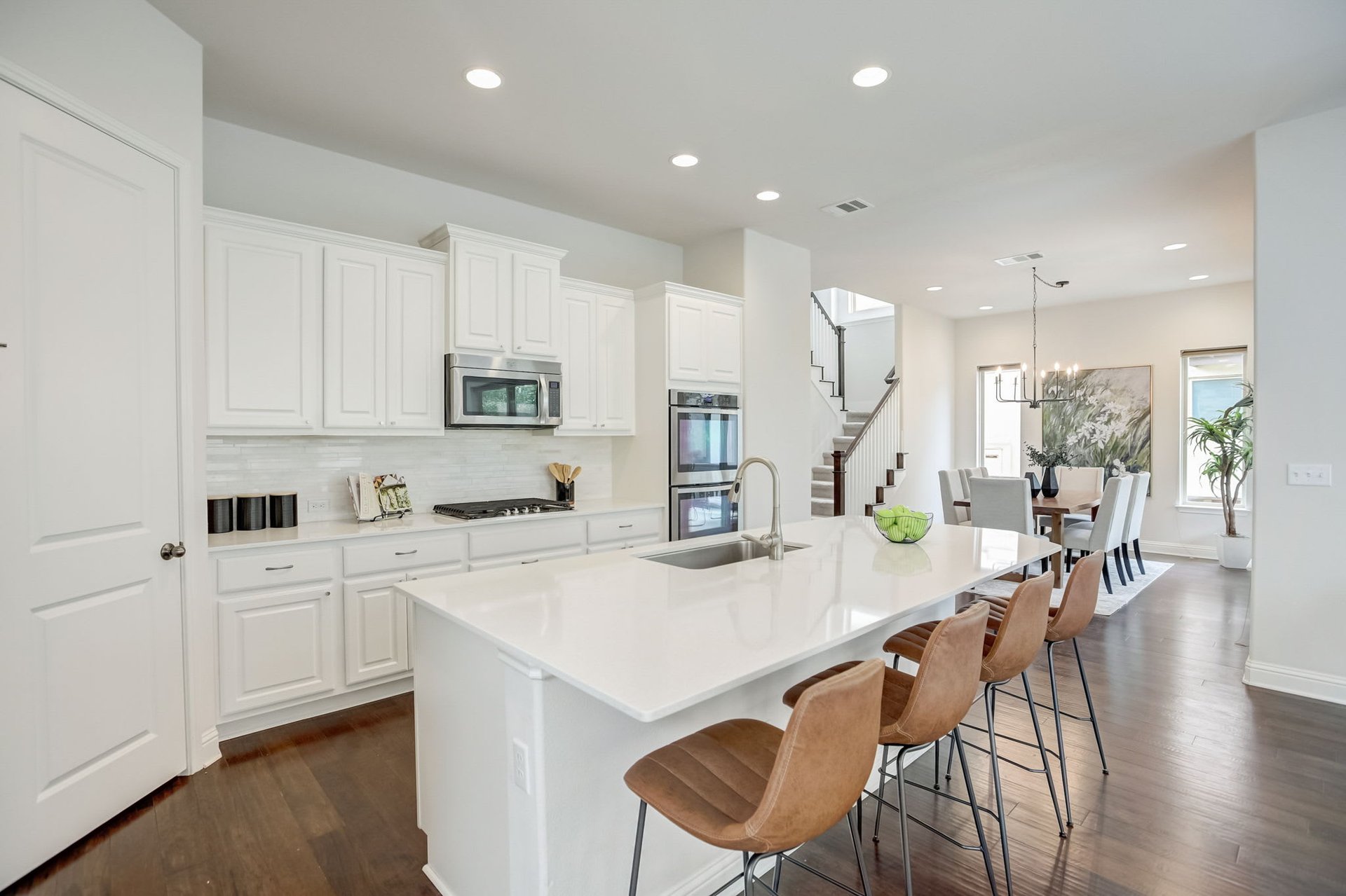Spacious 4-Bedroom Home in The Preserve at Four Points – A+ School District, Open Floorplan, Luxurious Primary Suite, Covered Patio, and More!
