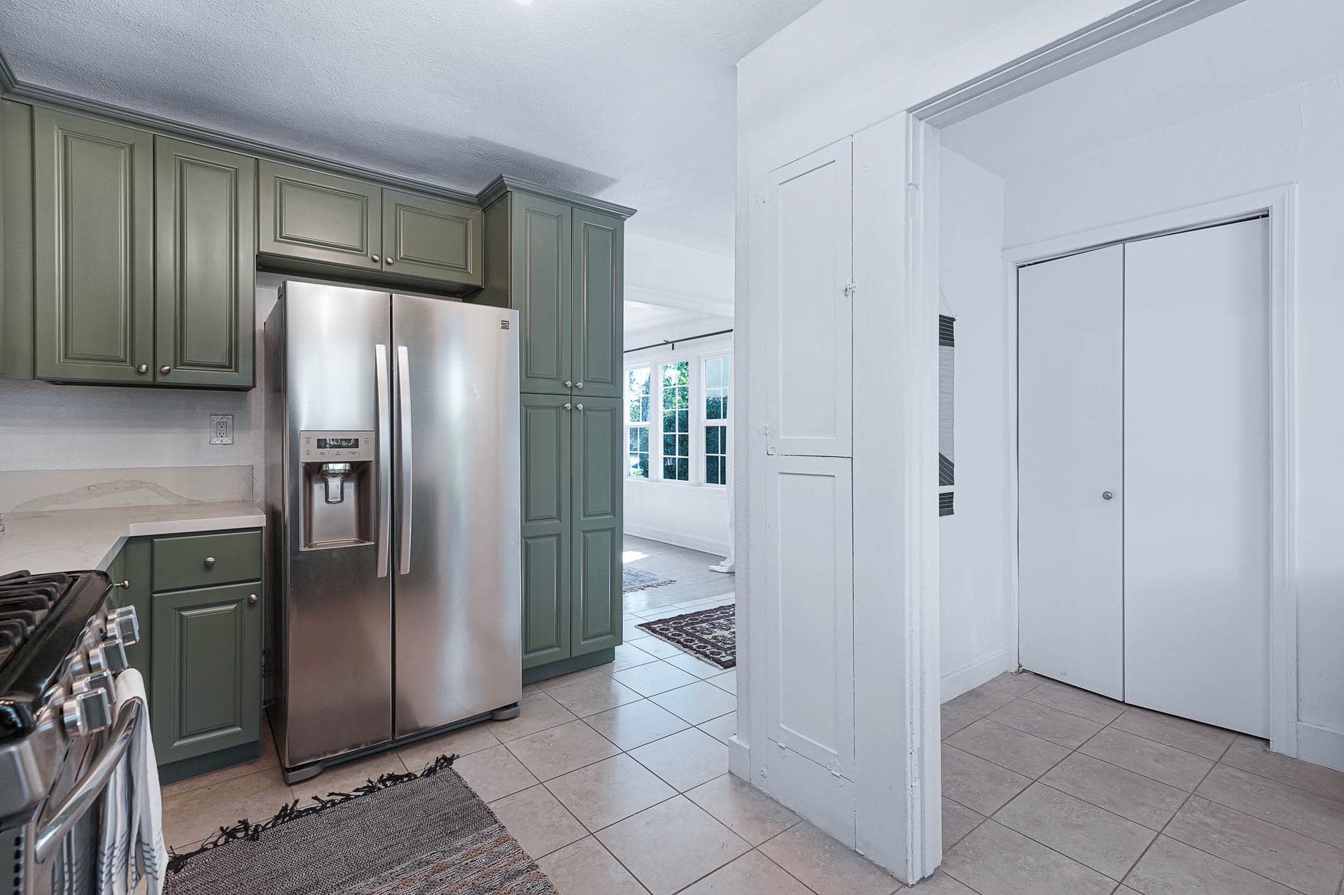 Light & Bright East Coast Traditional Home with Exterior Office & Bonus $2400/mos Rental Unit Above Garage -  in coveted Miracle Mile South!