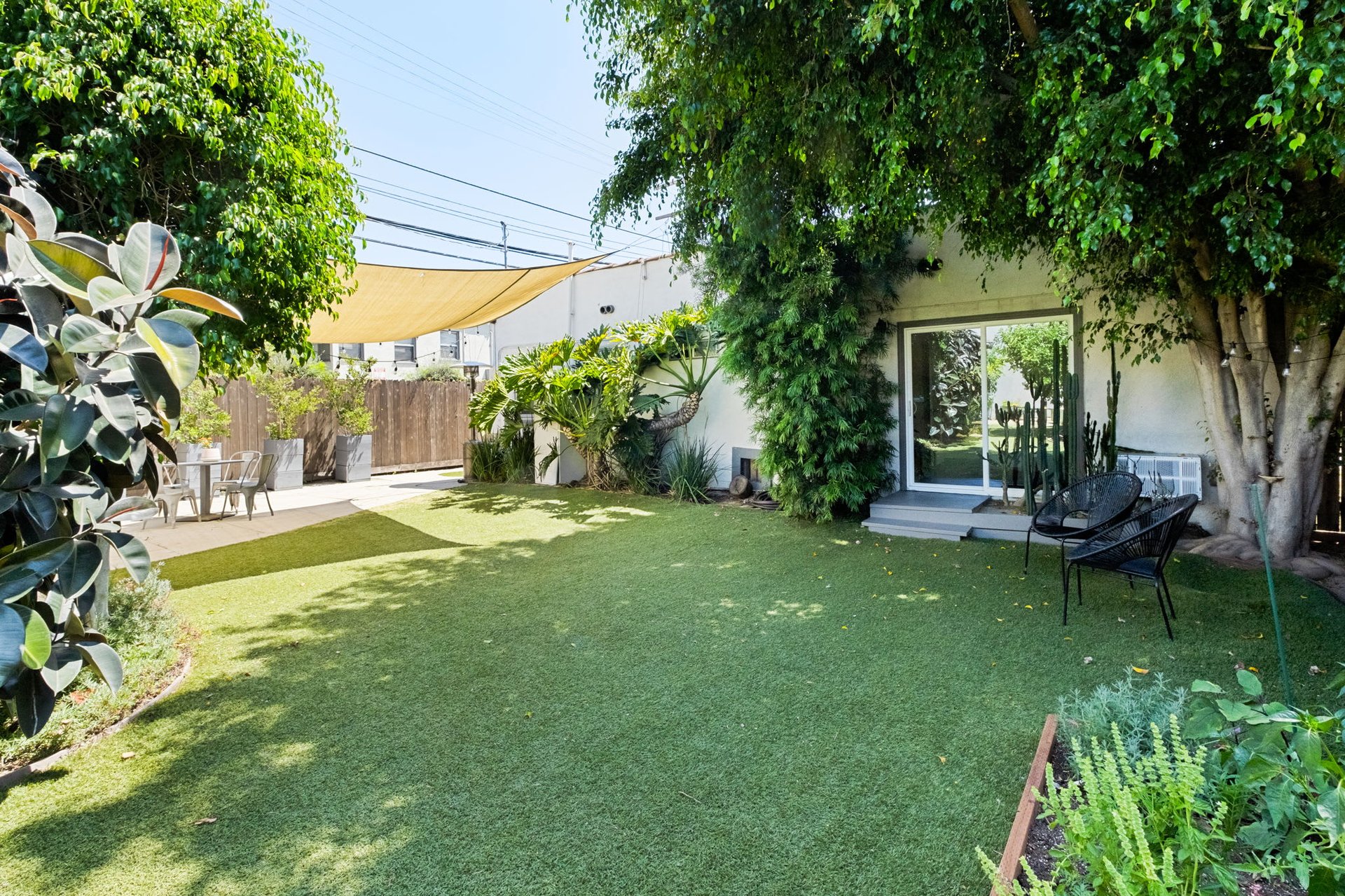 Lush & Private Spanish Compound in coveted Wilshire Highlands neighborhood!
