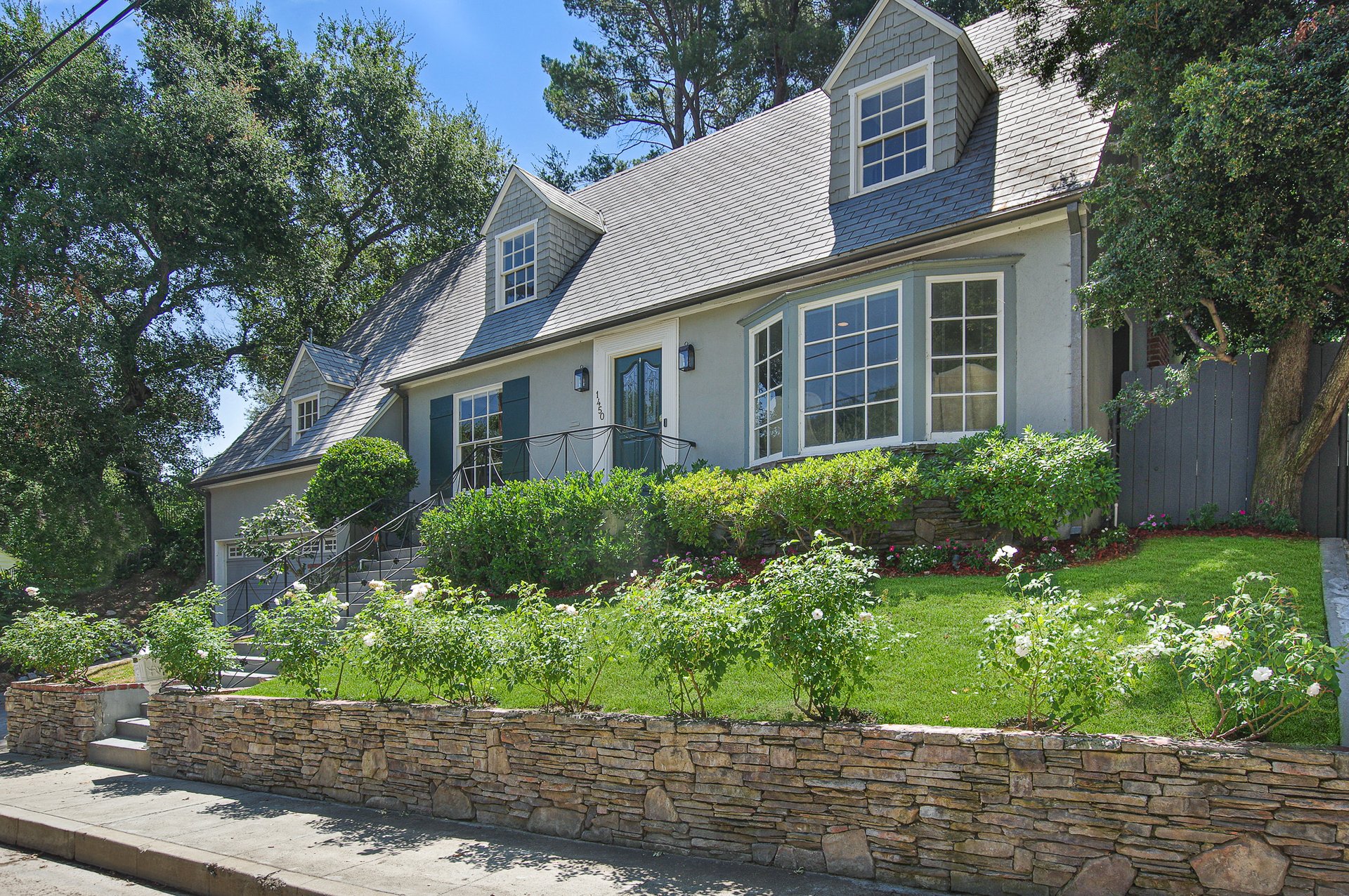 BEAUTIFULLY RESTORED, STORYBOOK CAPE COD HOME IN PRIME VERDUGO WOODLANDS.