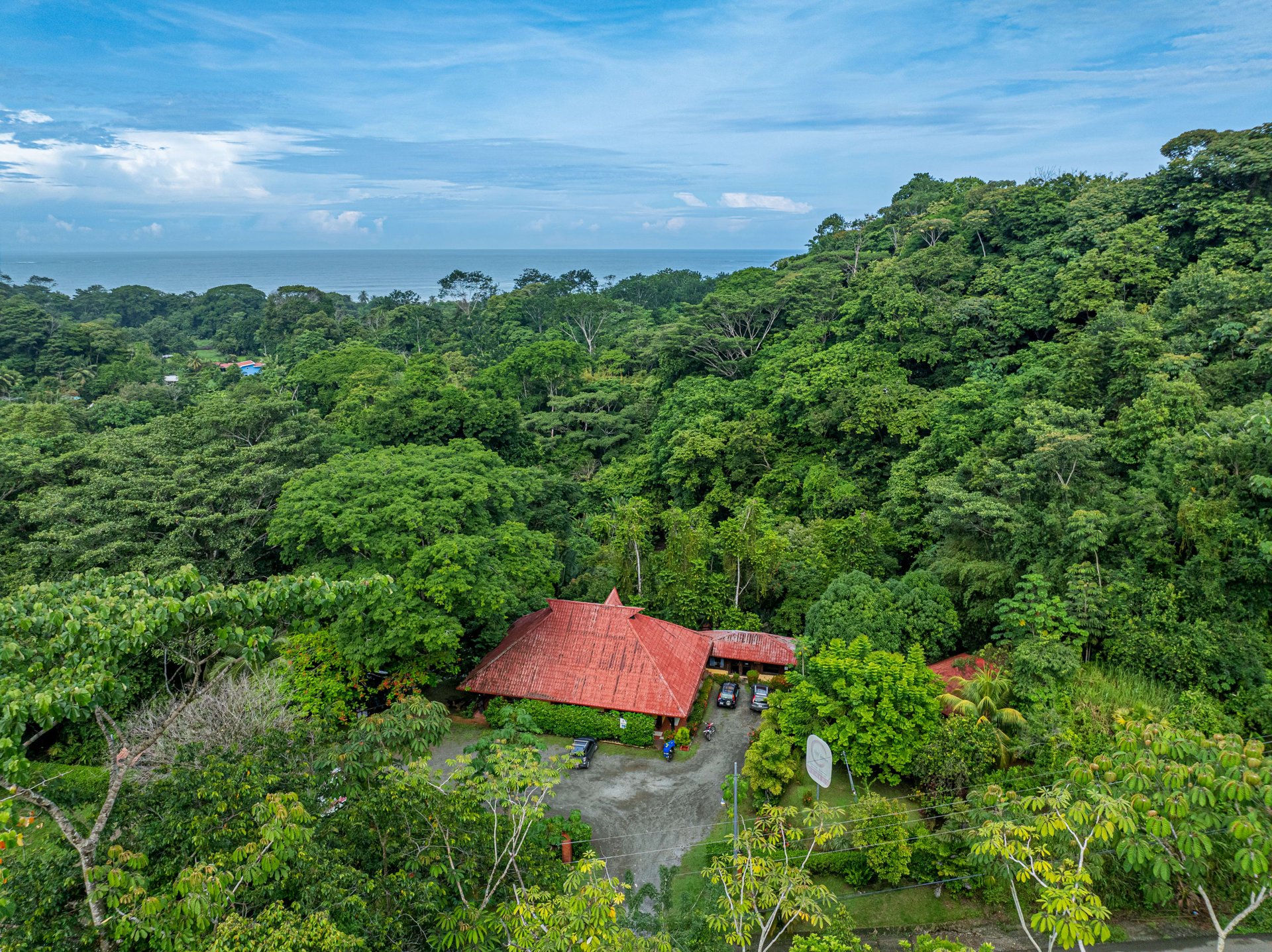 10-Acre Uvita Commercial Property with Existing Hotel & Highway Frontage – Development Potential Near the Beach