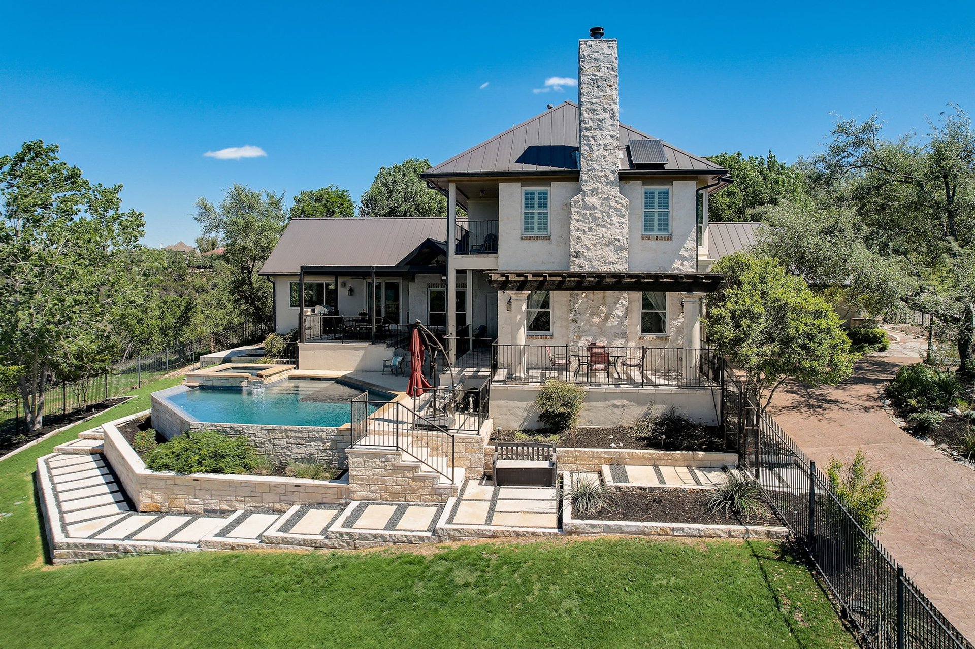 Hill Country Paradise: Luxurious 4/3 Home with Heated Pool/Spa and Spectacular Sunset Views in River Place!