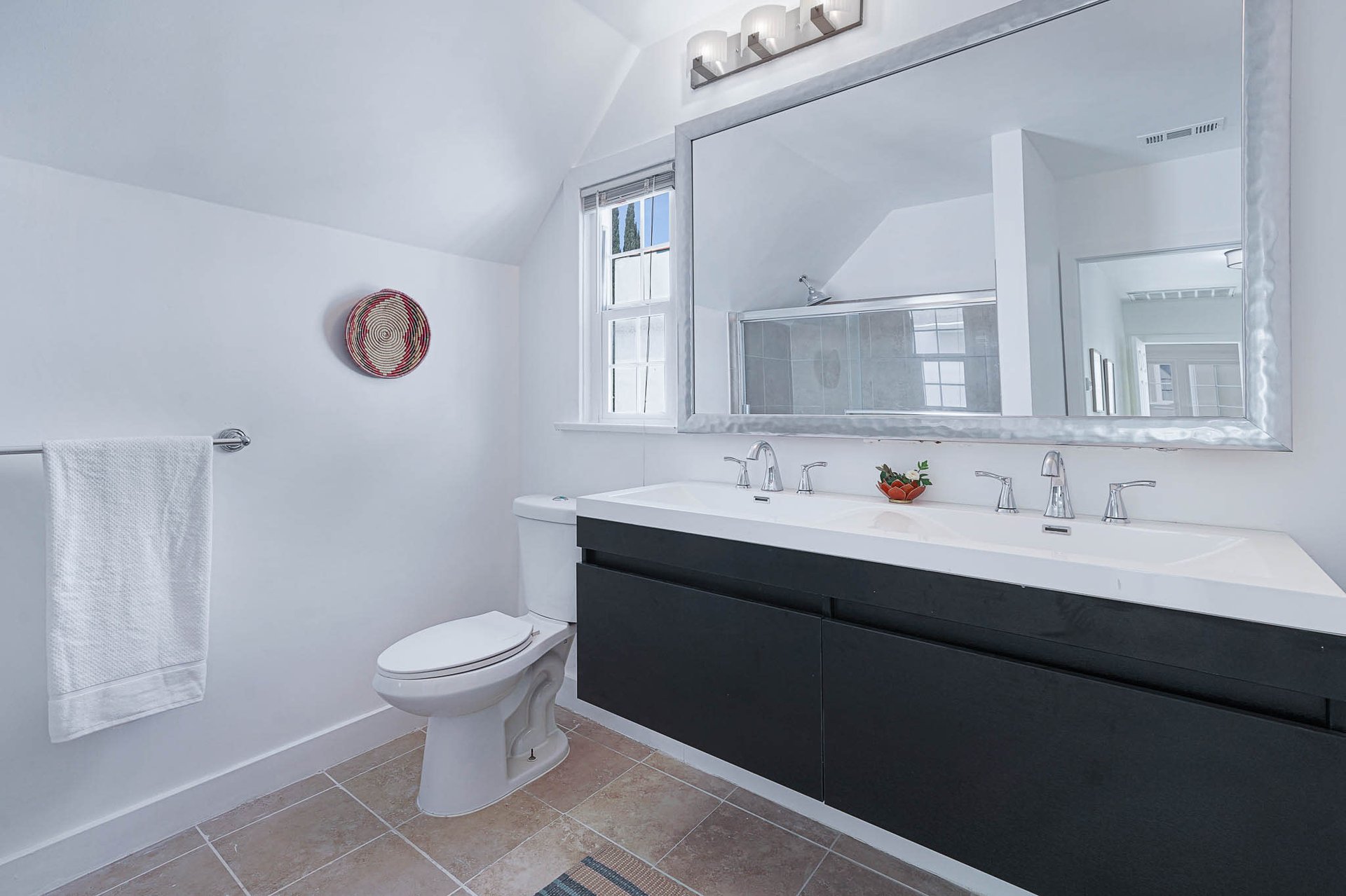 Light & Bright East Coast Traditional Home with Exterior Office & Bonus $2400/mos Rental Unit Above Garage -  in coveted Miracle Mile South!