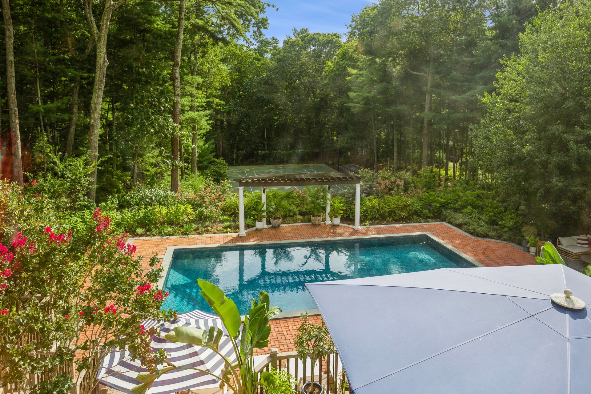 Resort-Style Living on 4 Quiet & Private East Hampton Acres