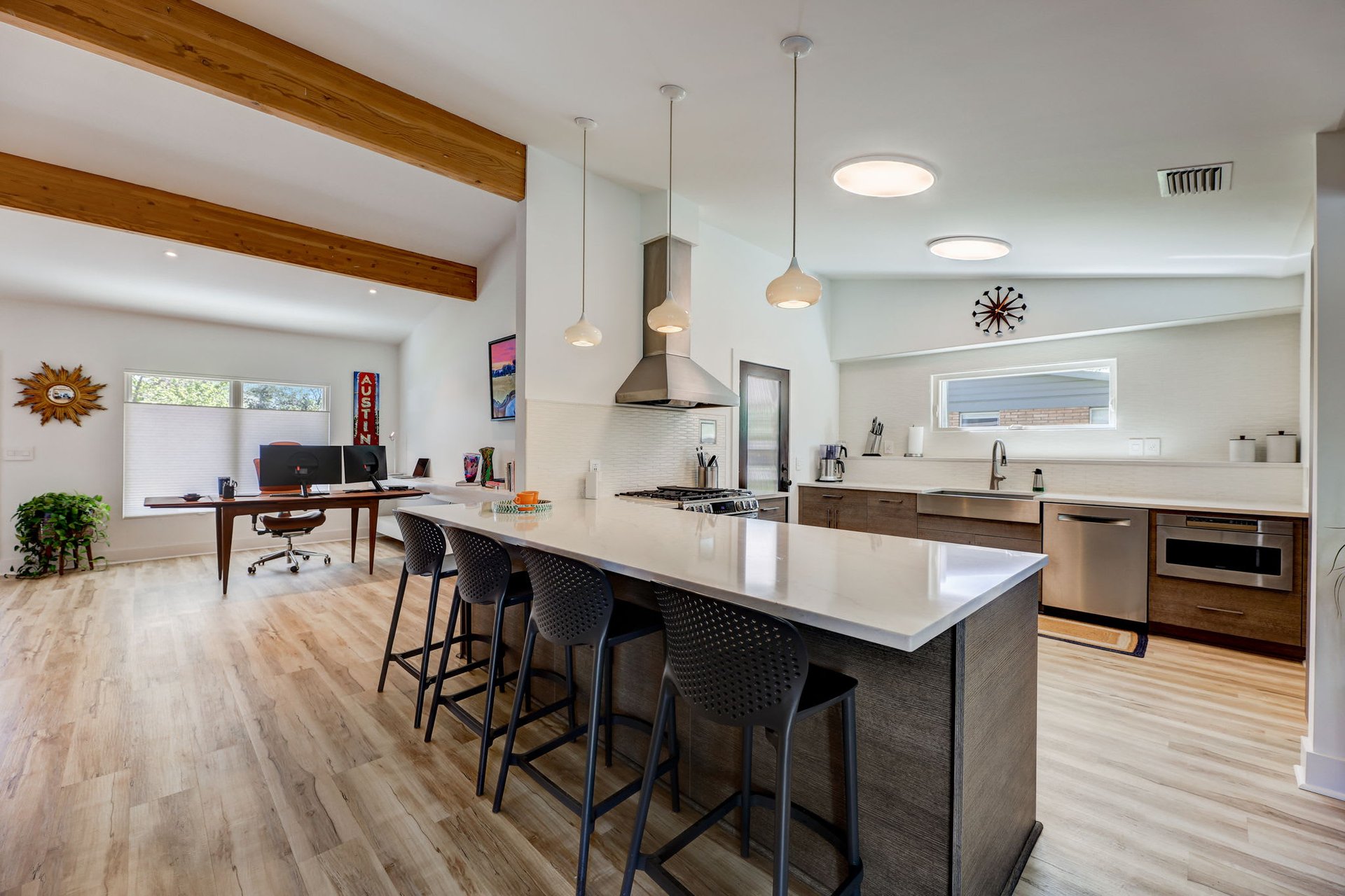 Stunning modern mid-century rebuilt home in the sought-after Delwood Heights near Mueller!