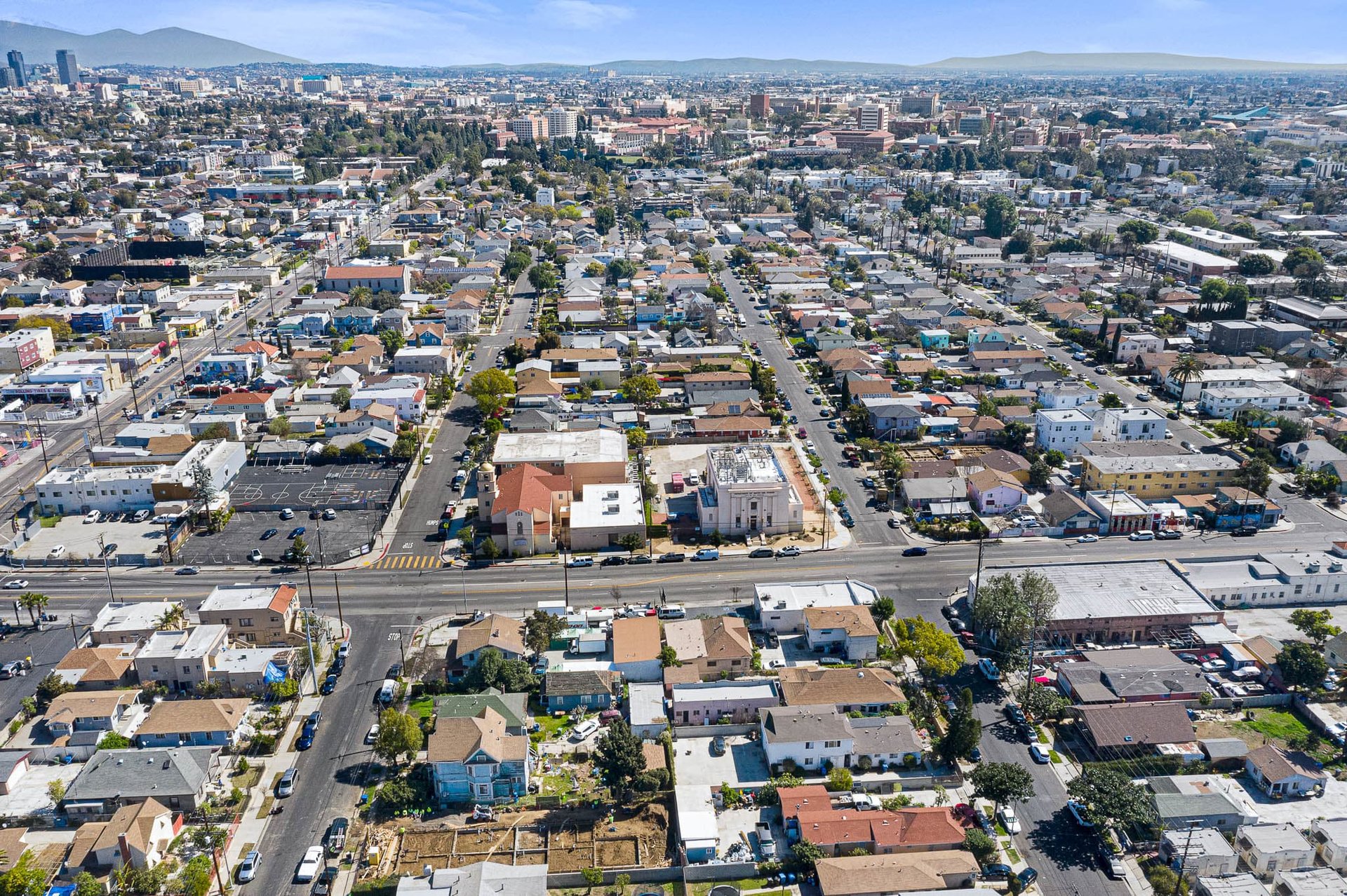 Incredible Triplex Apartment Opportunity near USC. Great Cash Flow. Vacant Lot in Rear for future Development!