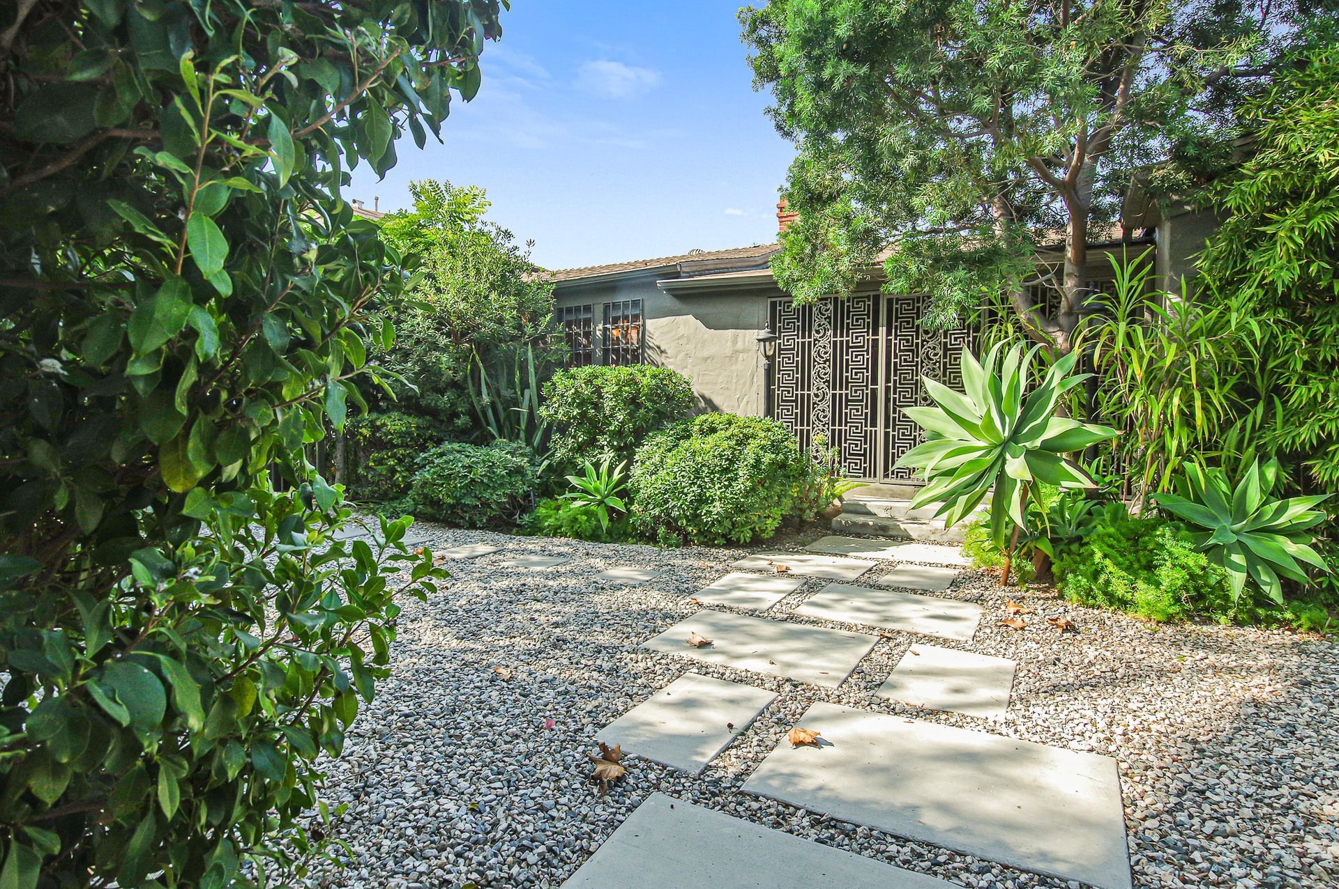 BREATHTAKING RESTORATION & RE-IMAGINED TRADITIONAL HOME IN MIRACLE MILE