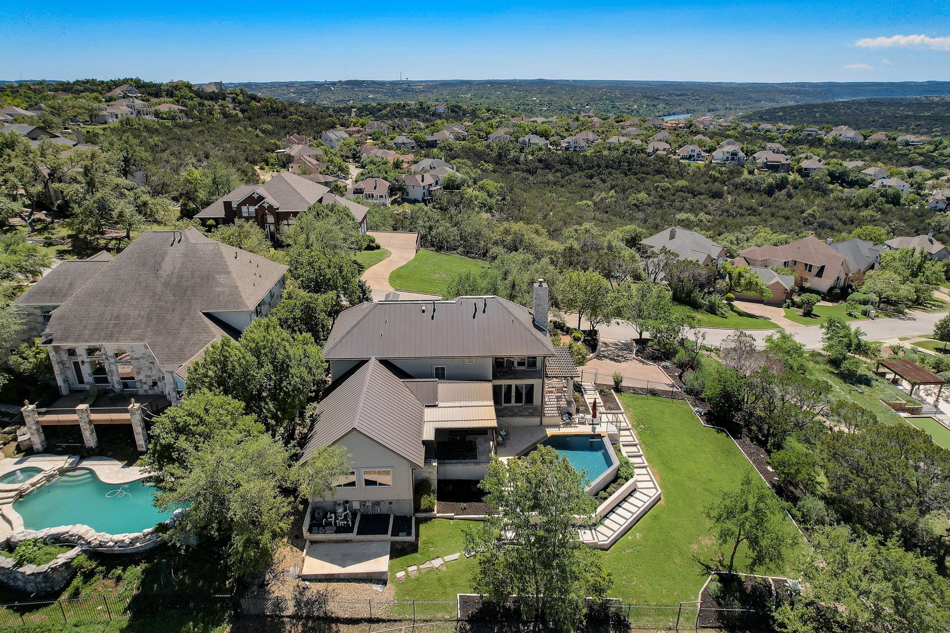 Hill Country Paradise: Luxurious 4/3 Home with Heated Pool/Spa and Spectacular Sunset Views in River Place!