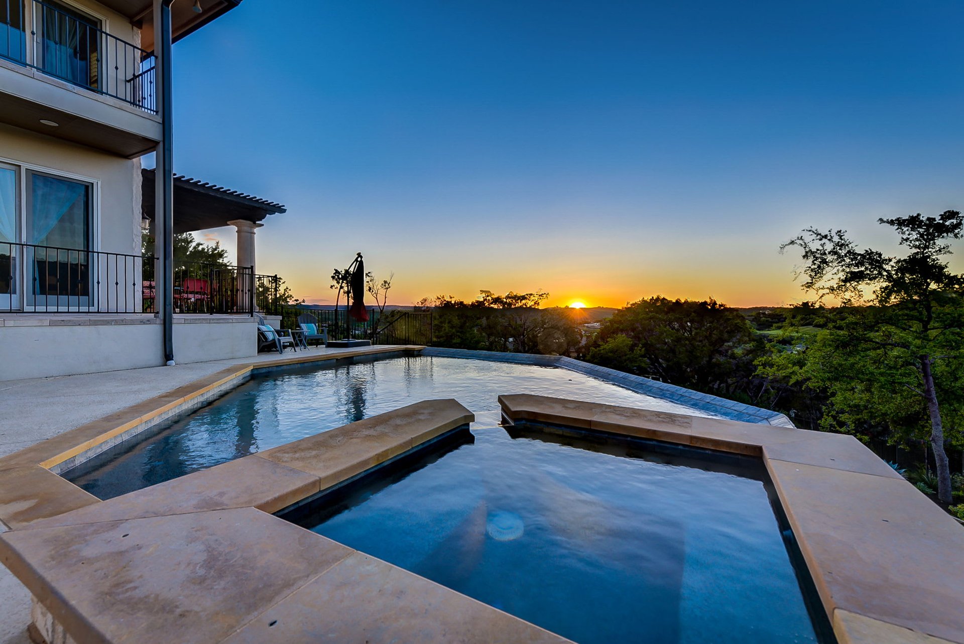 Hill Country Paradise: Luxurious 4/3 Home with Heated Pool/Spa and Spectacular Sunset Views in River Place!