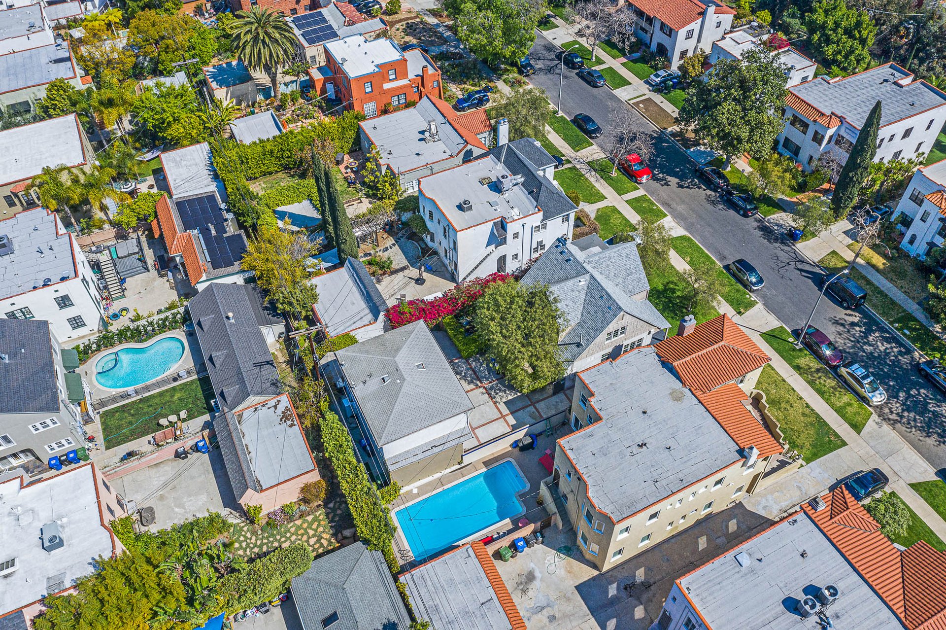 Light & Bright East Coast Traditional Home with Exterior Office & Bonus $2400/mos Rental Unit Above Garage -  in coveted Miracle Mile South!