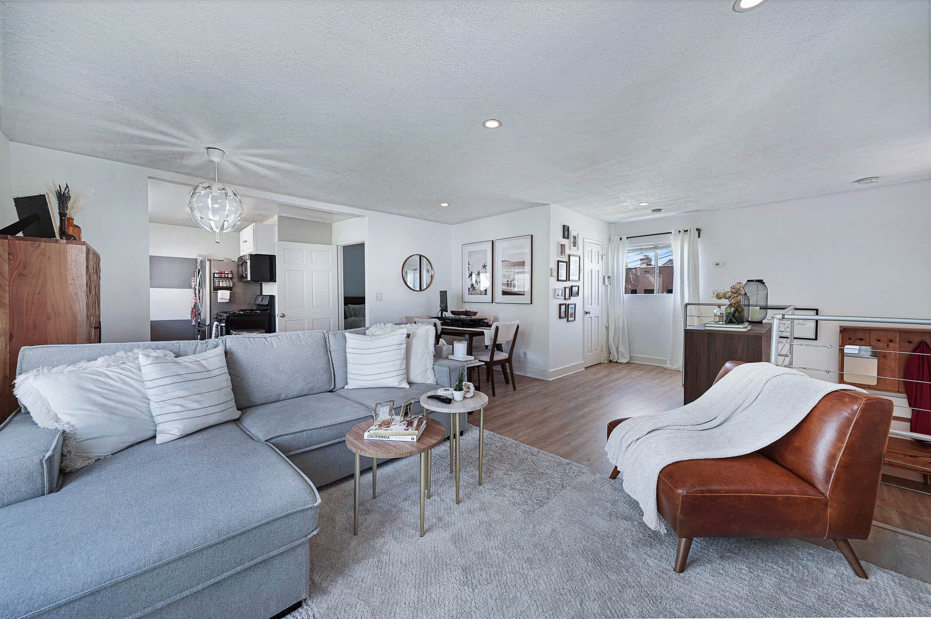 Light & Bright East Coast Traditional Home with Exterior Office & Bonus $2400/mos Rental Unit Above Garage -  in coveted Miracle Mile South!