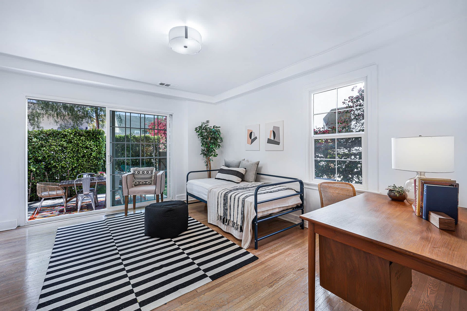 Light & Bright East Coast Traditional Home with Exterior Office & Bonus $2400/mos Rental Unit Above Garage -  in coveted Miracle Mile South!