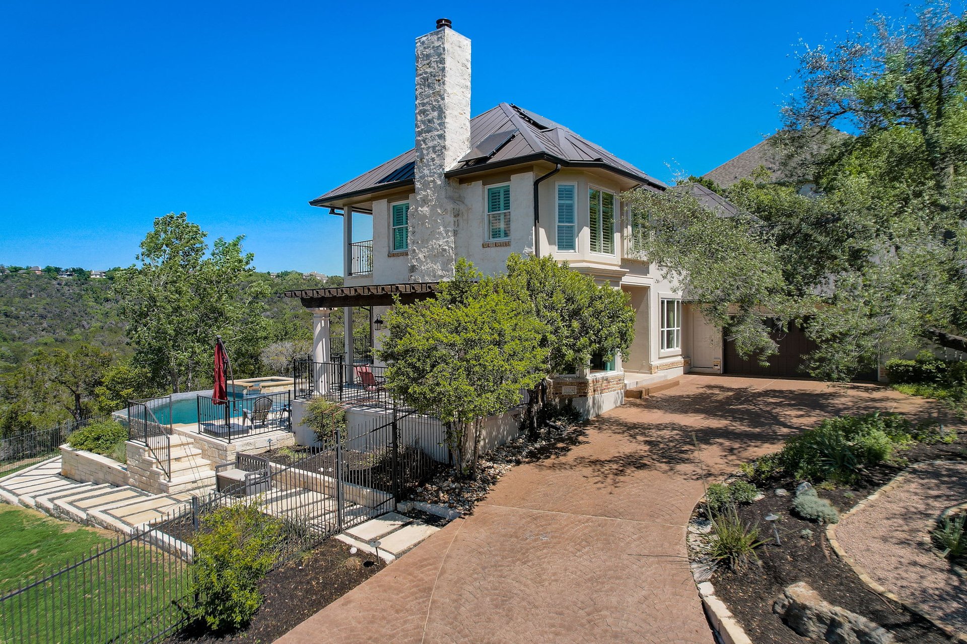 Hill Country Paradise: Luxurious 4/3 Home with Heated Pool/Spa and Spectacular Sunset Views in River Place!