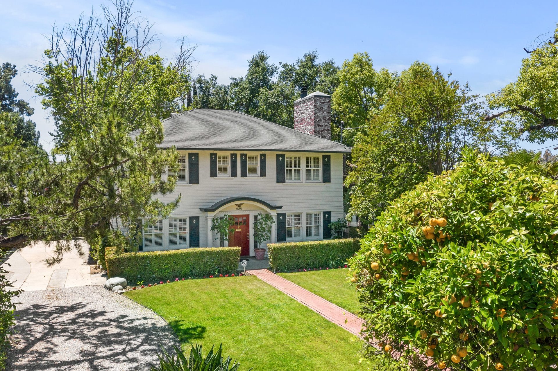 Stately Georgian Colonial located in the beautiful Historic Highlands Landmark District of Pasadena.