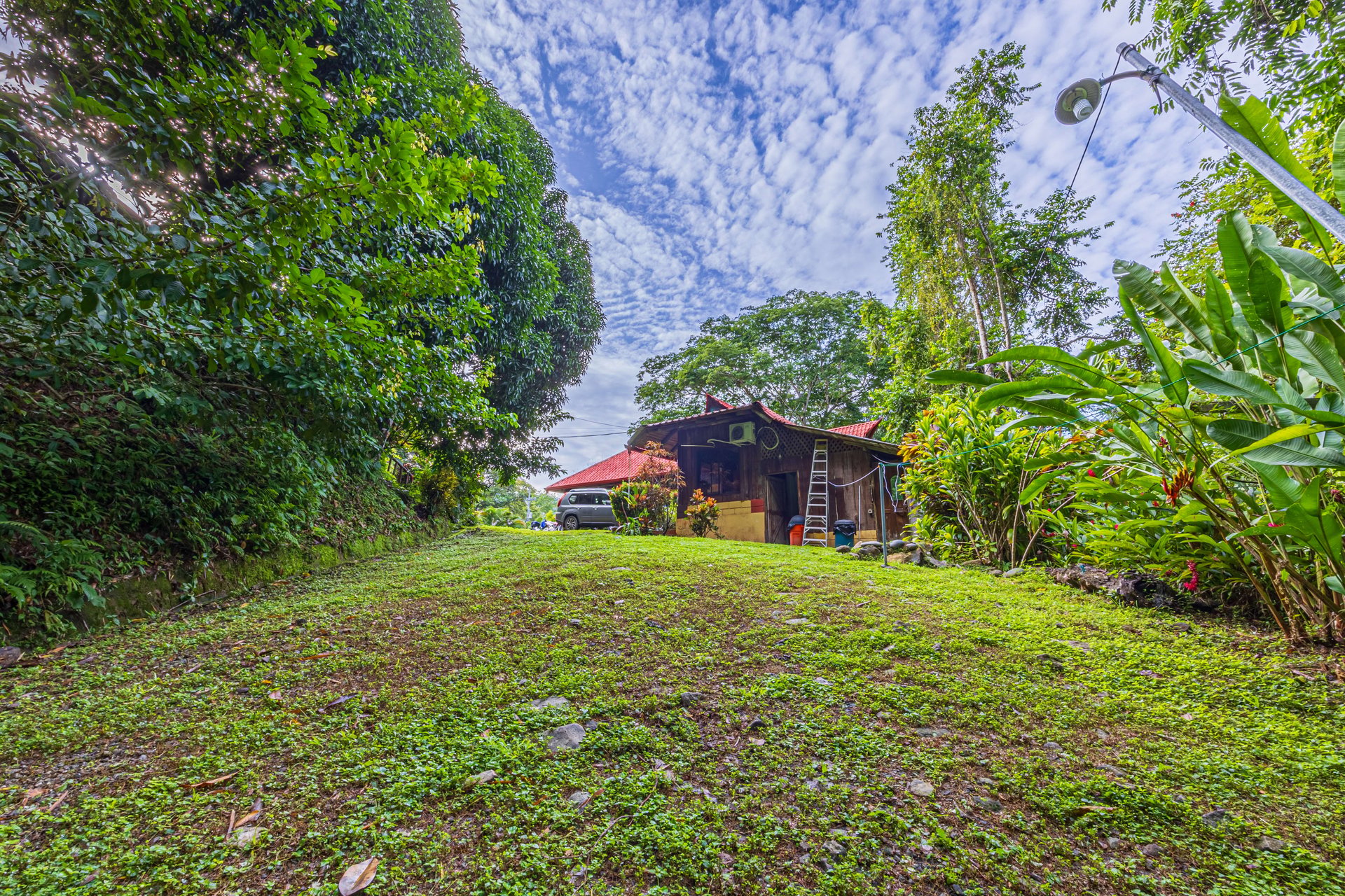 10-Acre Uvita Commercial Property with Existing Hotel & Highway Frontage – Development Potential Near the Beach