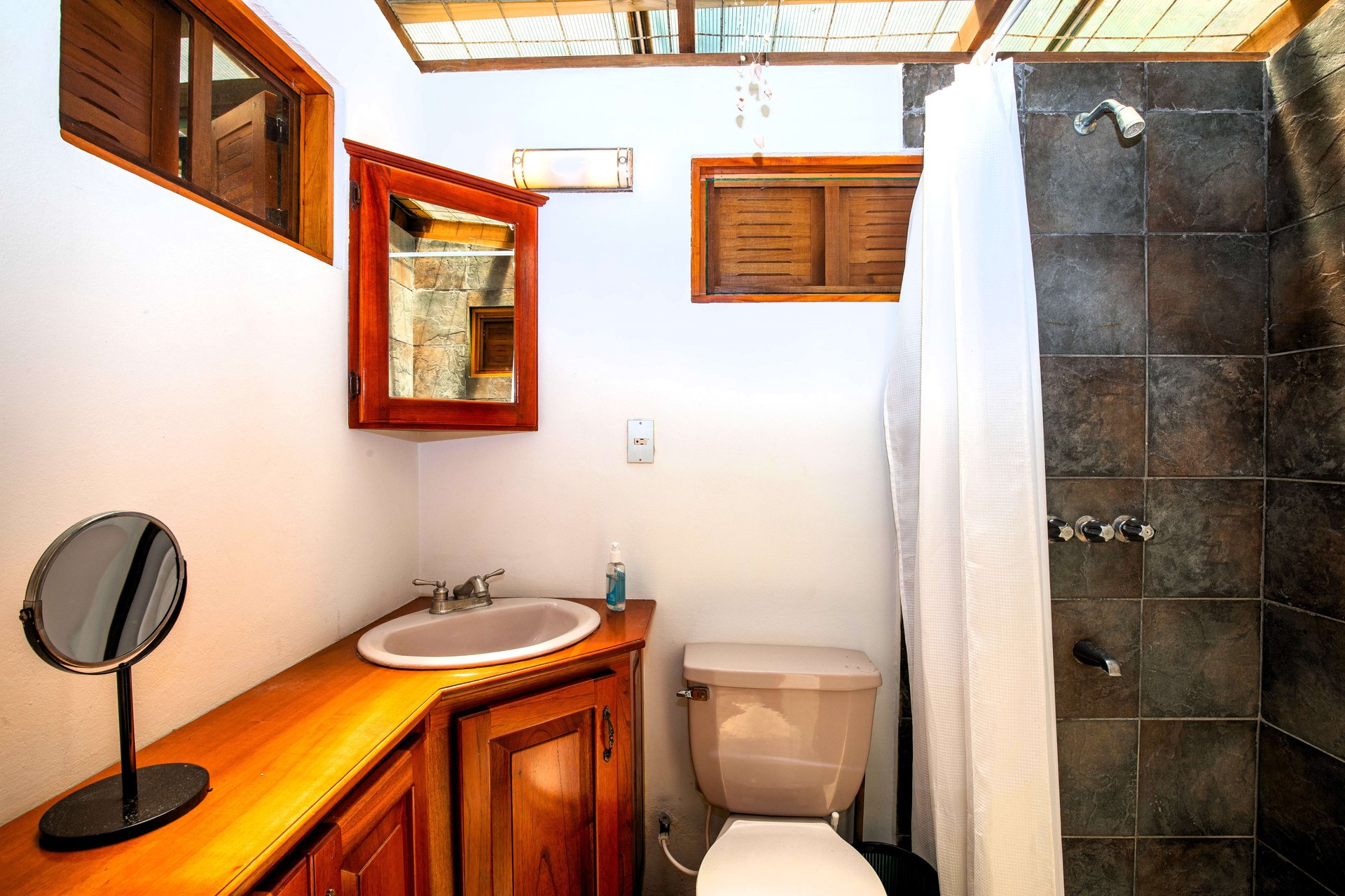 A MONEY MAKER! Location, home, guest cabins, with a SUCCE$$FUL exclusive distribution agency!