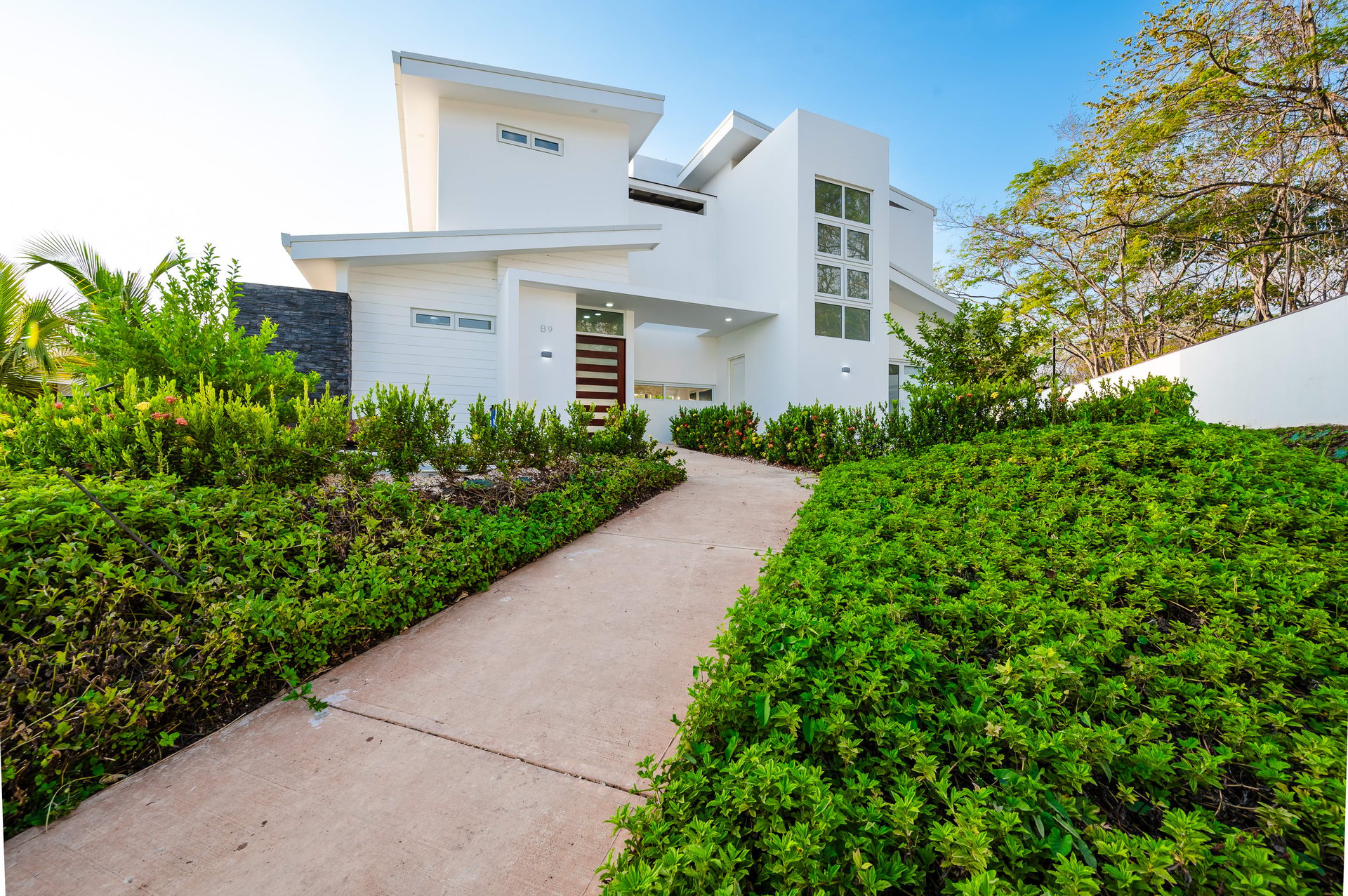 The Enclave | Ultra-Modern 5 Bedroom Villa Located Minutes From the Beach!