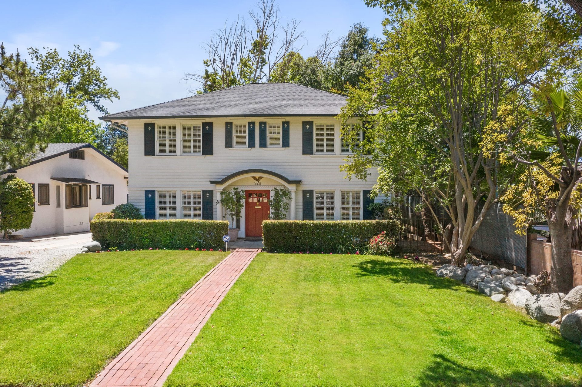 Stately Georgian Colonial located in the beautiful Historic Highlands Landmark District of Pasadena.