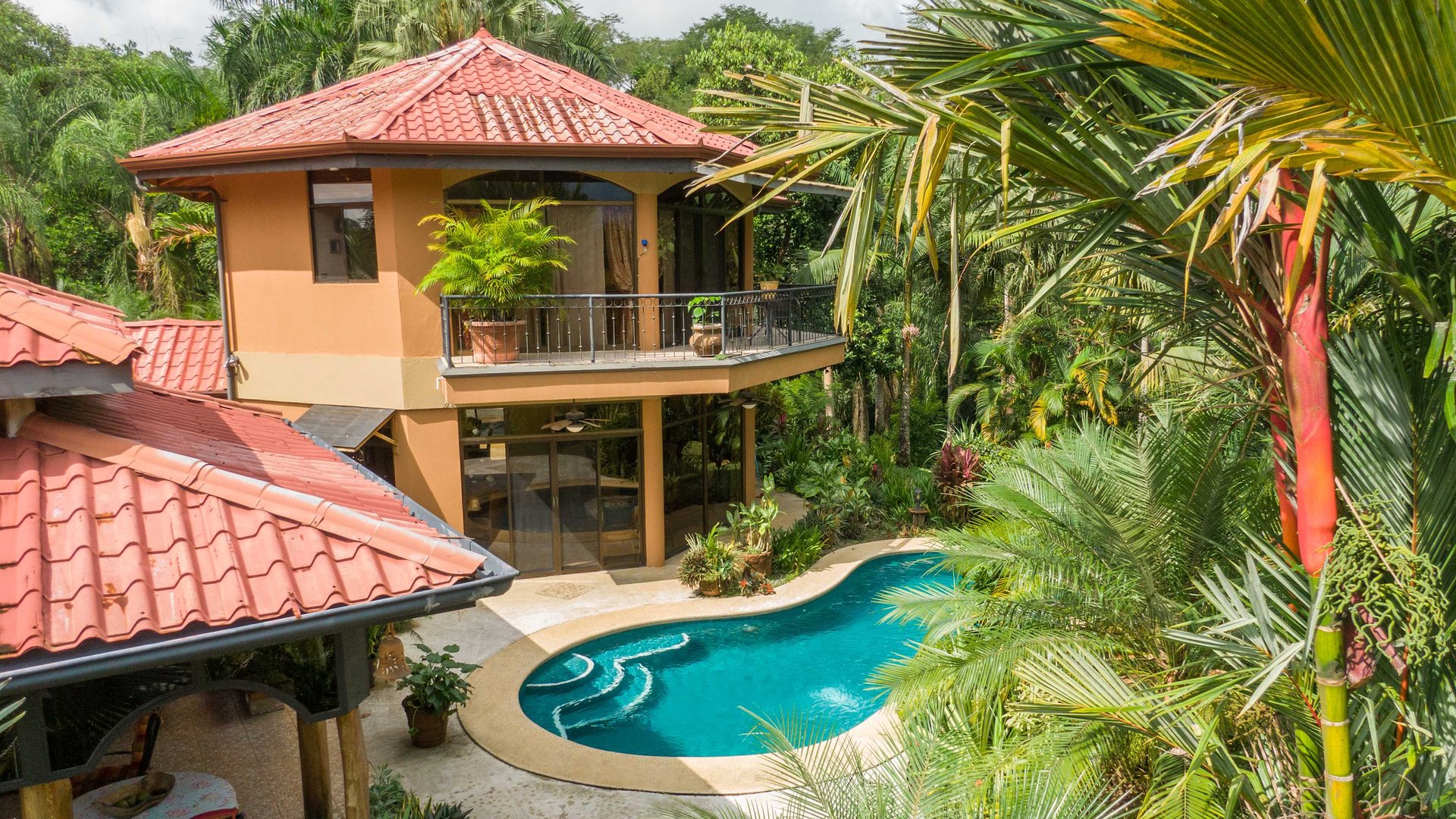 Stunning Tropical Home in Gated community with Hundreds of fruit trees  