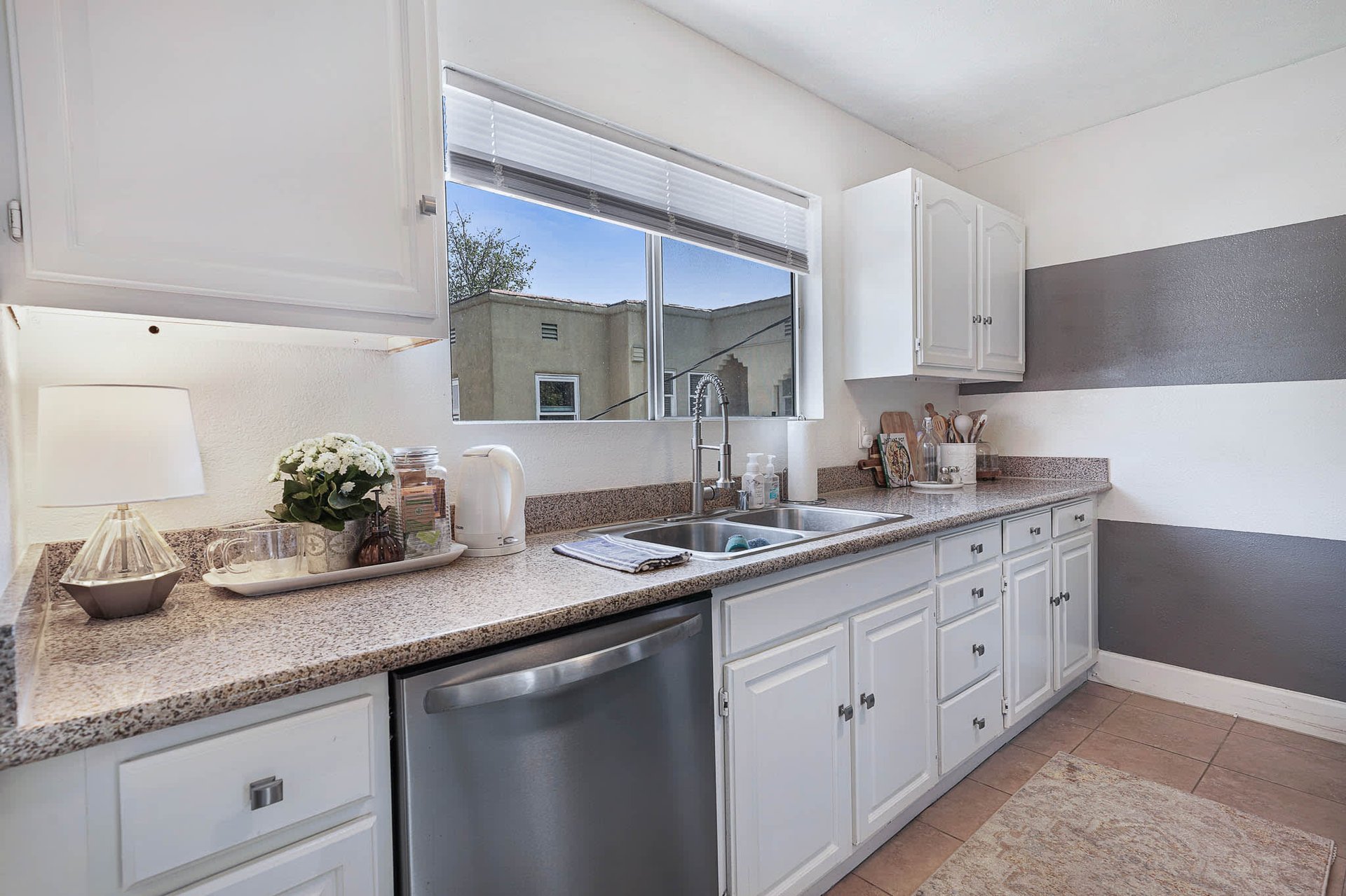 Light & Bright East Coast Traditional Home with Exterior Office & Bonus $2400/mos Rental Unit Above Garage -  in coveted Miracle Mile South!