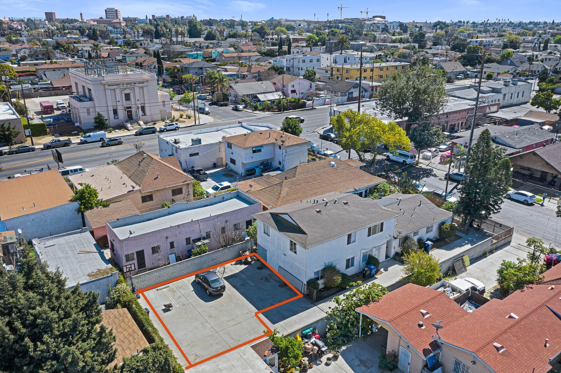 Incredible Triplex Apartment Opportunity near USC. Great Cash Flow. Vacant Lot in Rear for future Development!