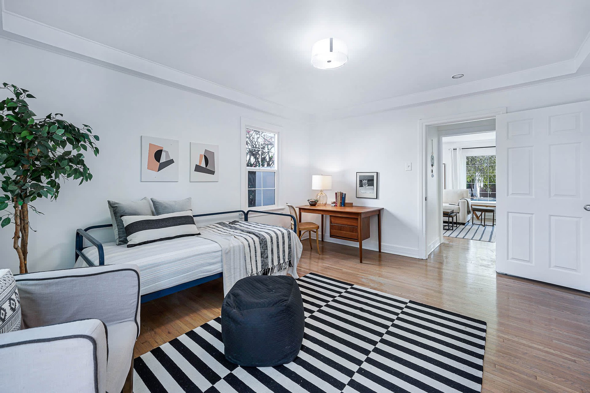 Light & Bright East Coast Traditional Home with Exterior Office & Bonus $2400/mos Rental Unit Above Garage -  in coveted Miracle Mile South!